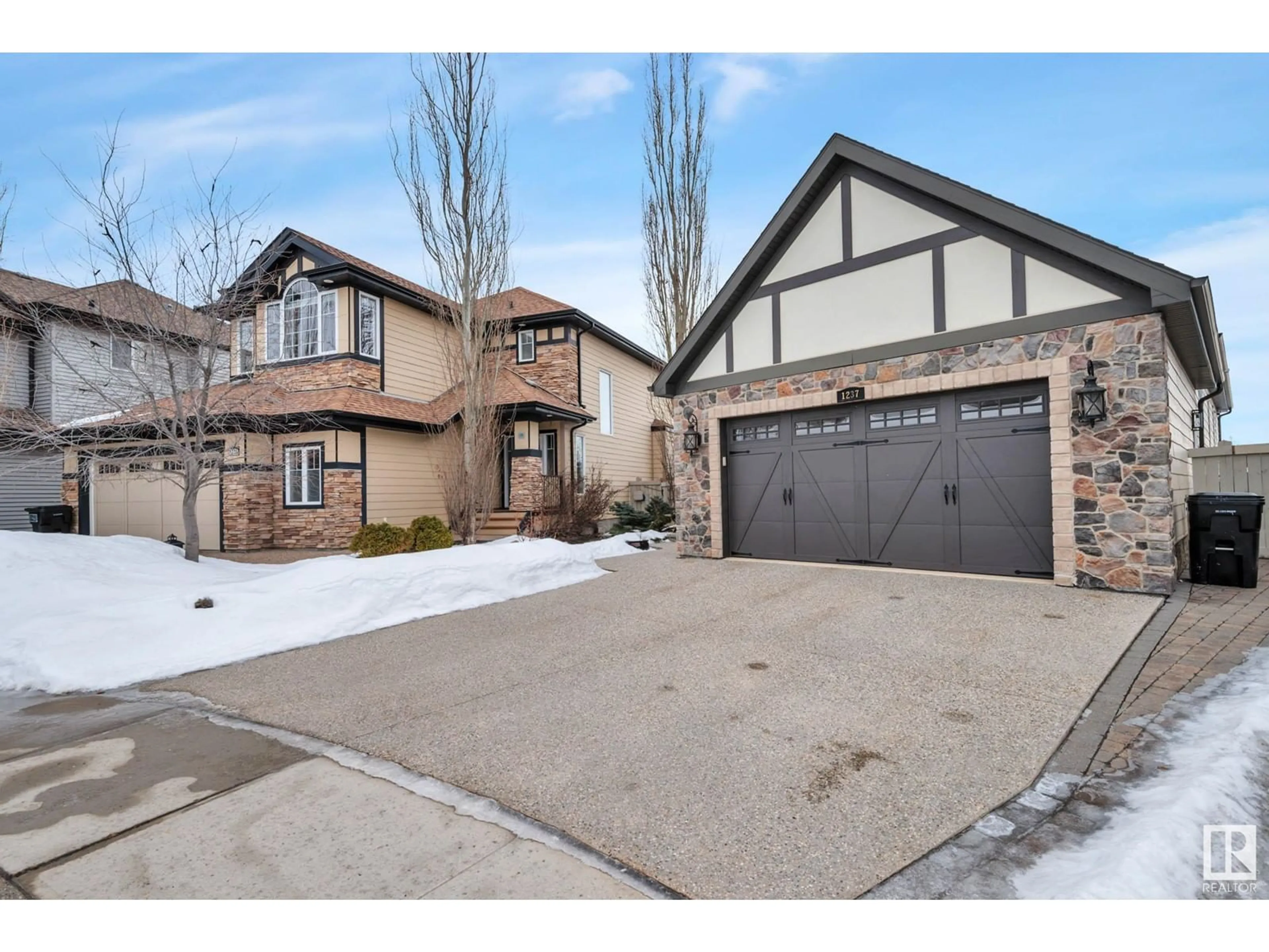 Home with brick exterior material, street for 1237 Chahley LD NW, Edmonton Alberta T6M0C9