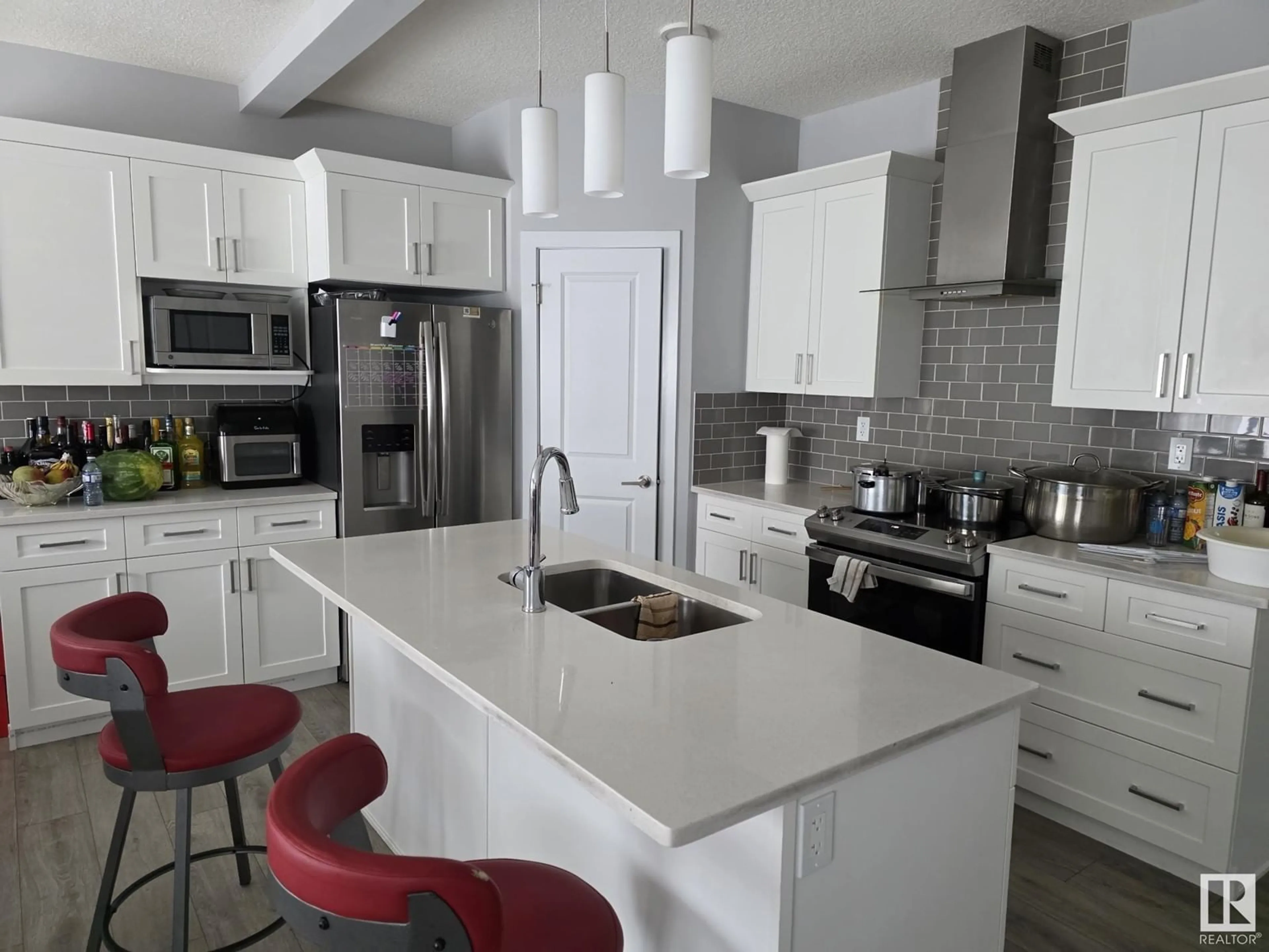 Open concept kitchen, ceramic/tile floor for 1510 ERKER LINK LI NW, Edmonton Alberta T6M0Z7