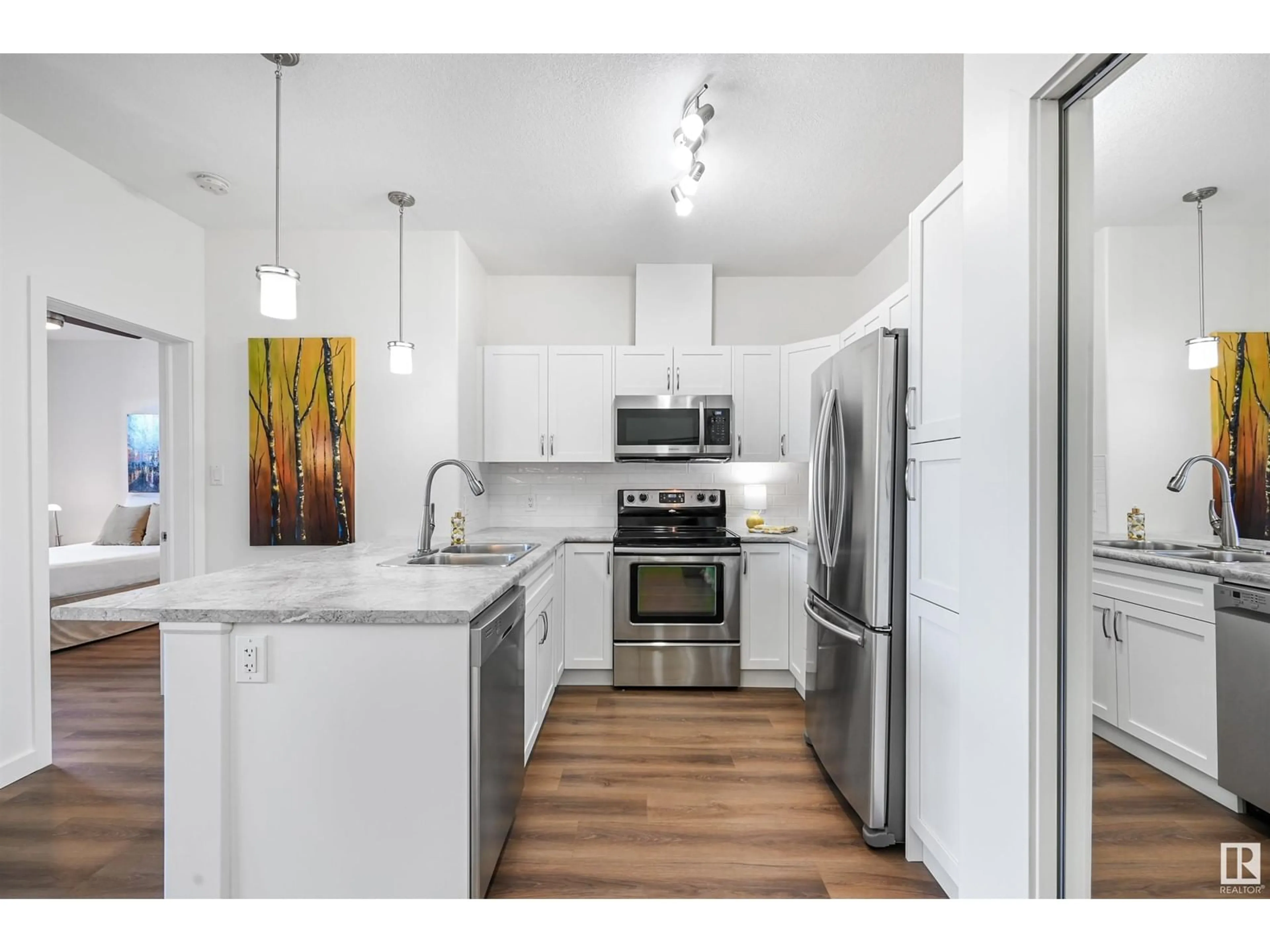 Open concept kitchen, unknown for #116 304 AMBLESIDE LI SW, Edmonton Alberta T6W0V2