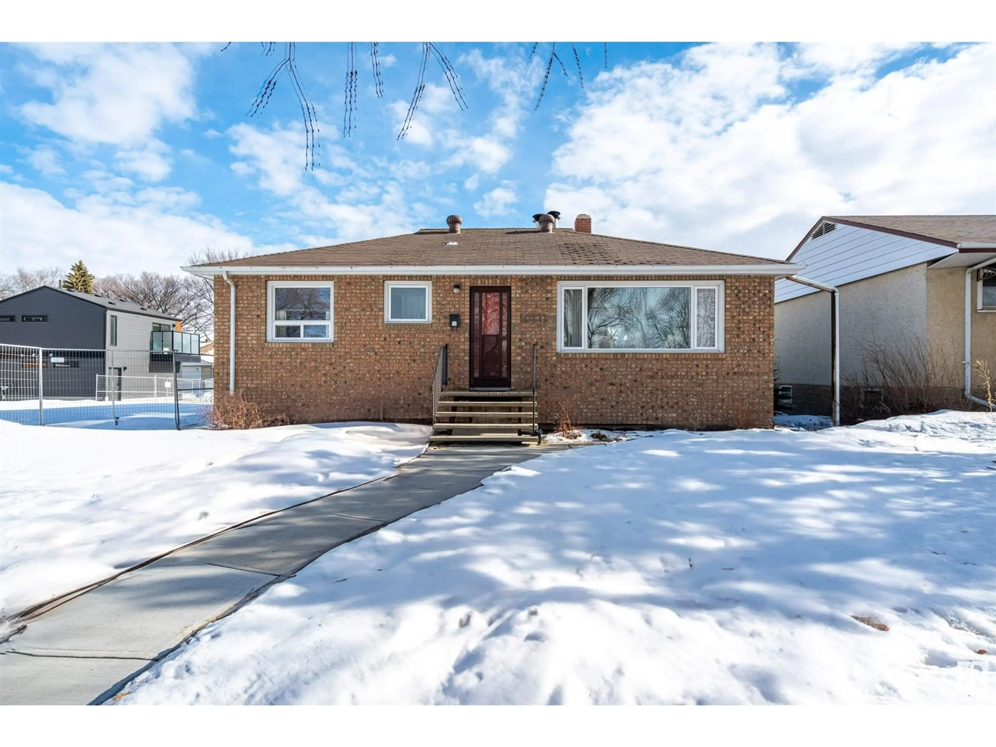 Home with brick exterior material, street for 10211 84 ST NW NW, Edmonton Alberta T6A3R1