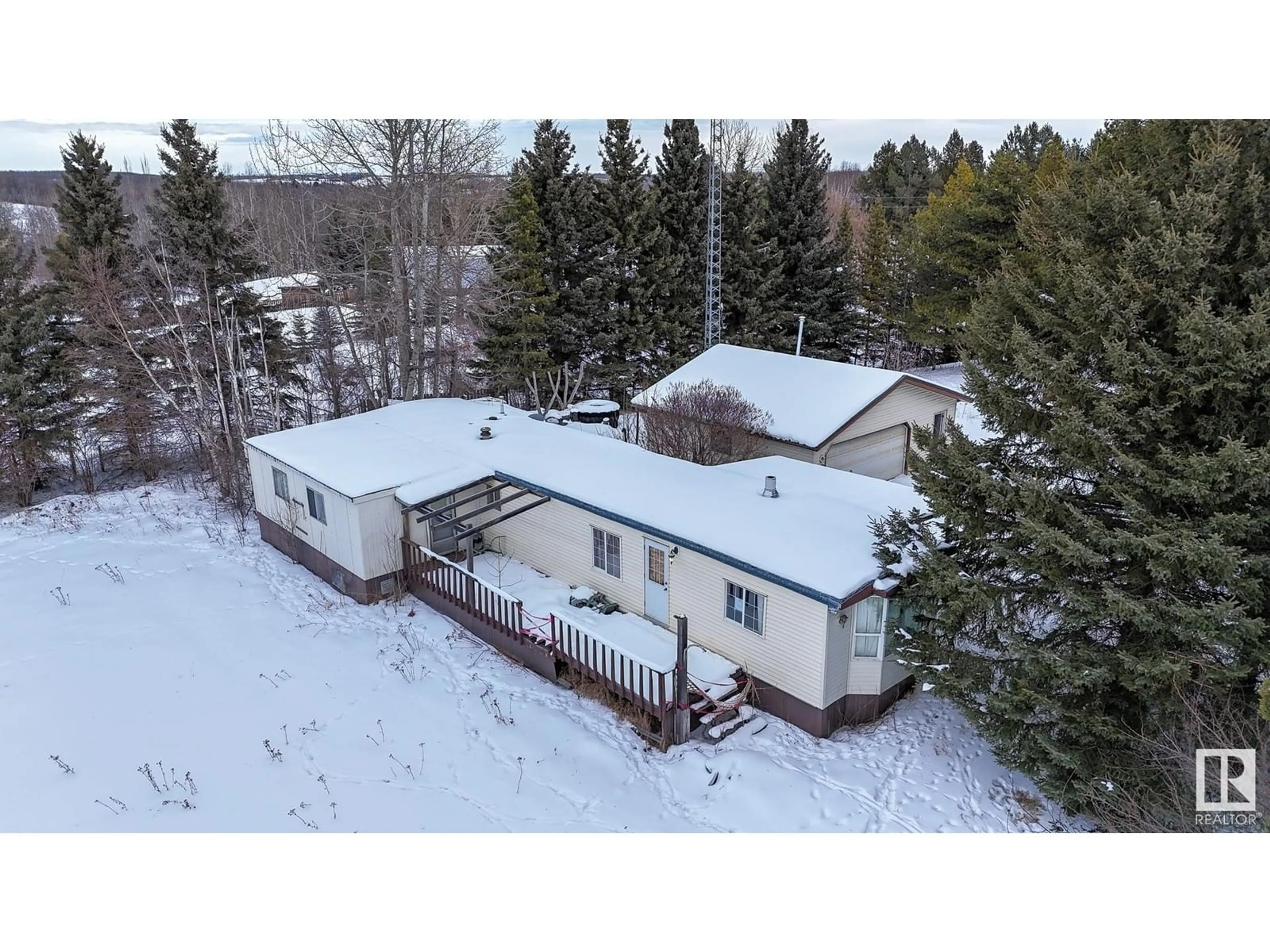 A pic from outside/outdoor area/front of a property/back of a property/a pic from drone, building for #12 53504 RGE ROAD 14, Rural Parkland County Alberta T7Y0B5