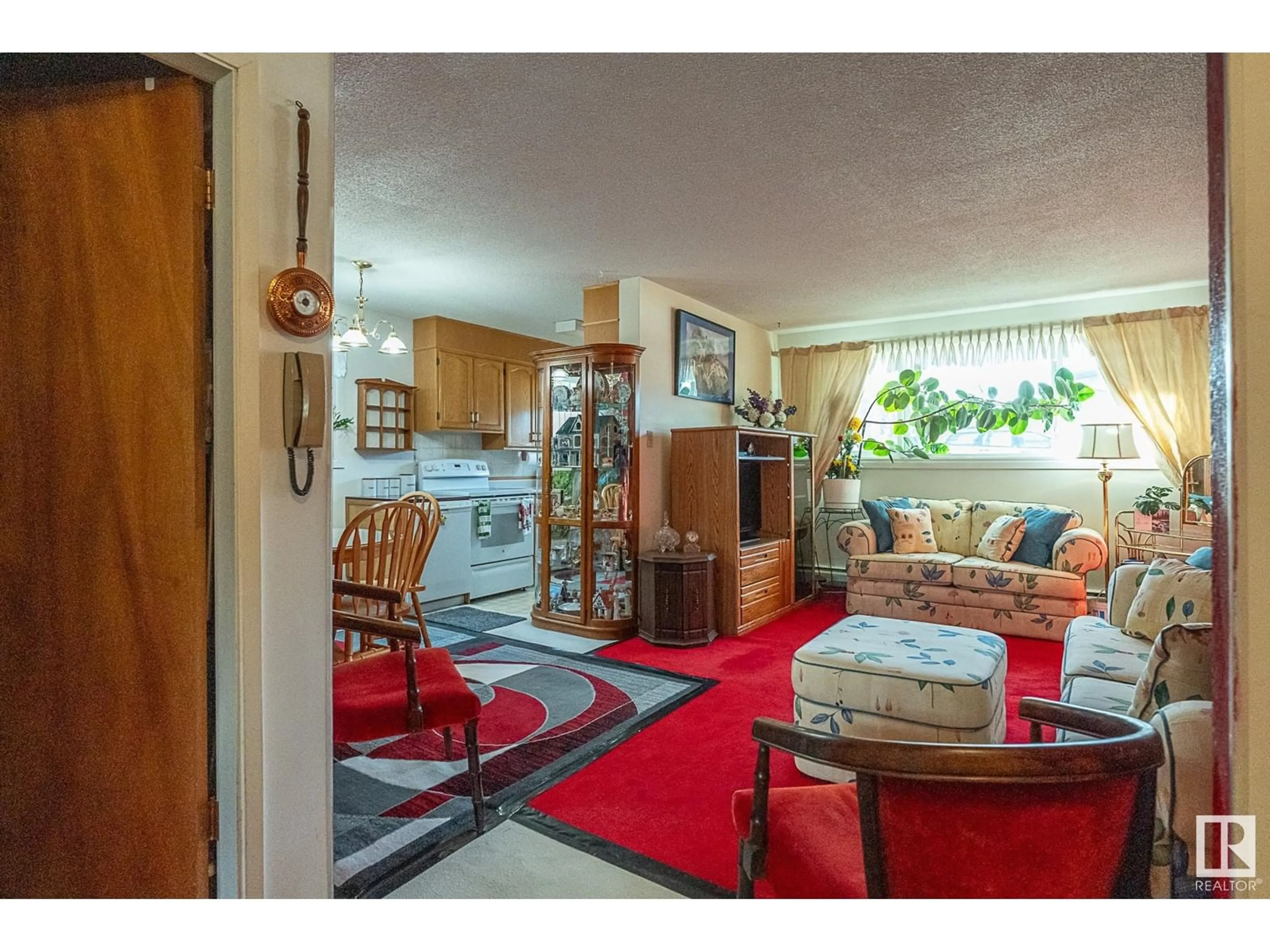 Living room with furniture, unknown for #104 11045 132 ST NW, Edmonton Alberta T5M1E4