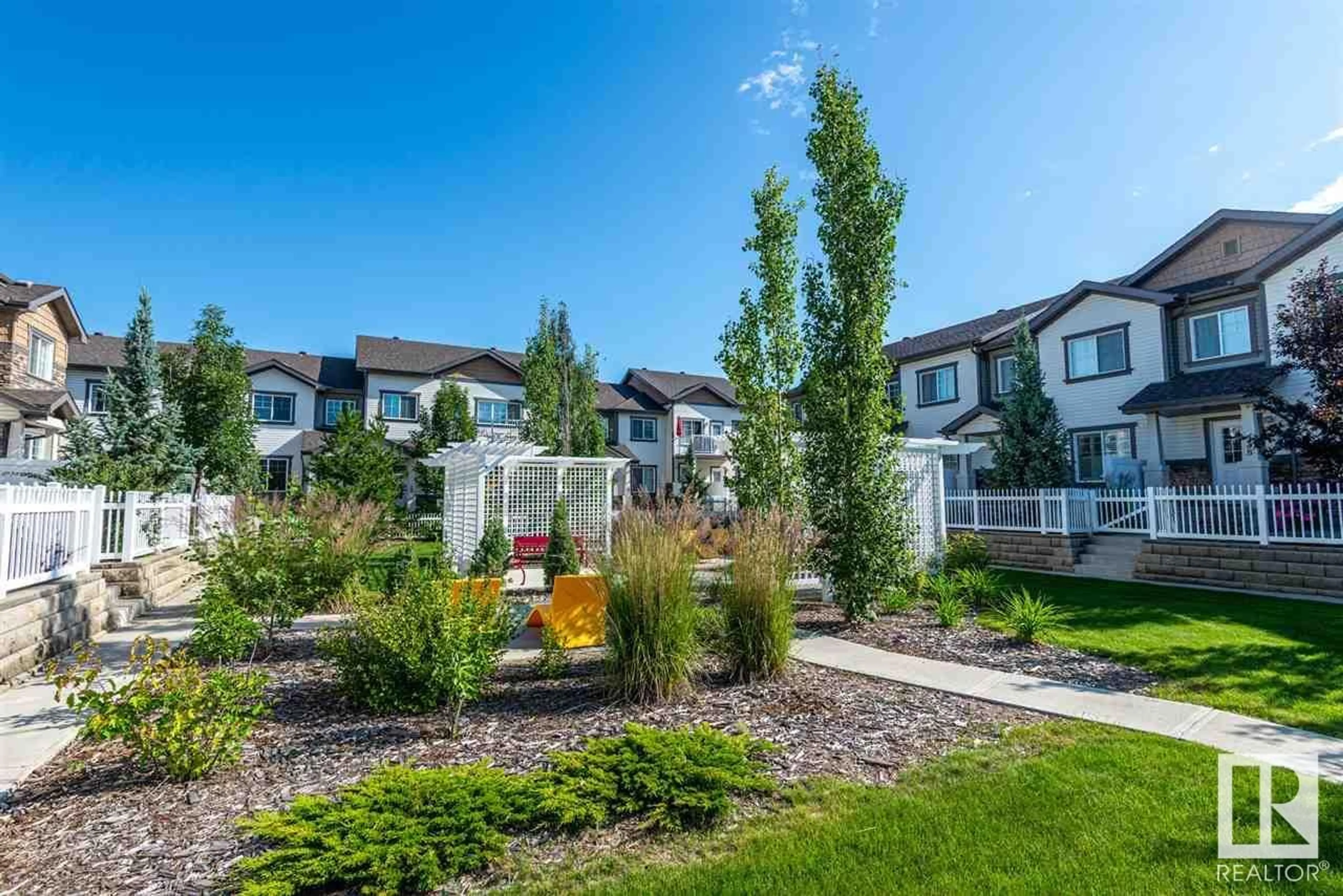 A pic from outside/outdoor area/front of a property/back of a property/a pic from drone, street for #28 4850 TERWILLEGAR CM NW, Edmonton Alberta T6R0T6