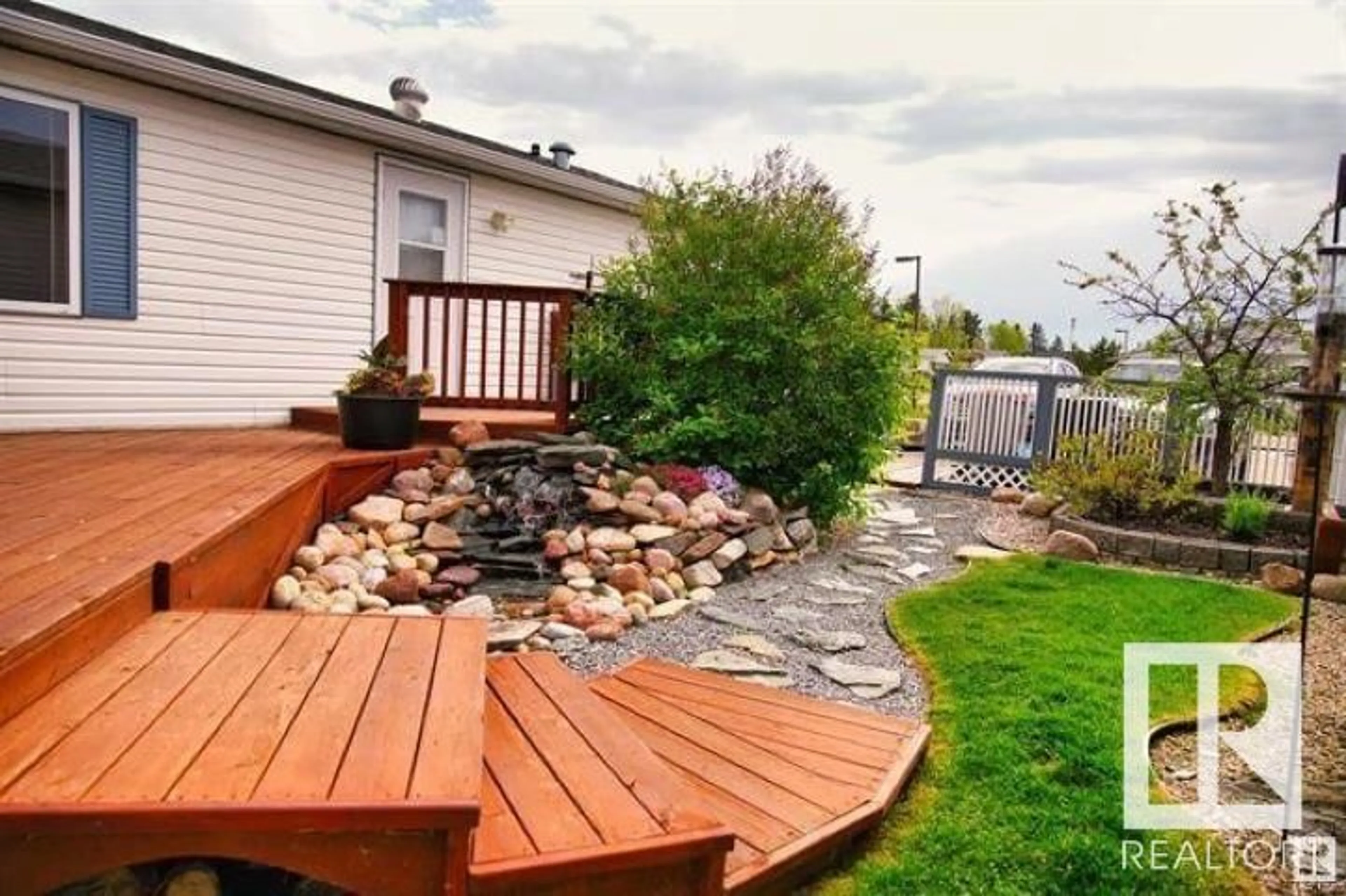 Patio, water/lake/river/ocean view for #100 4819 51 AV, Millet Alberta T0C1Z0