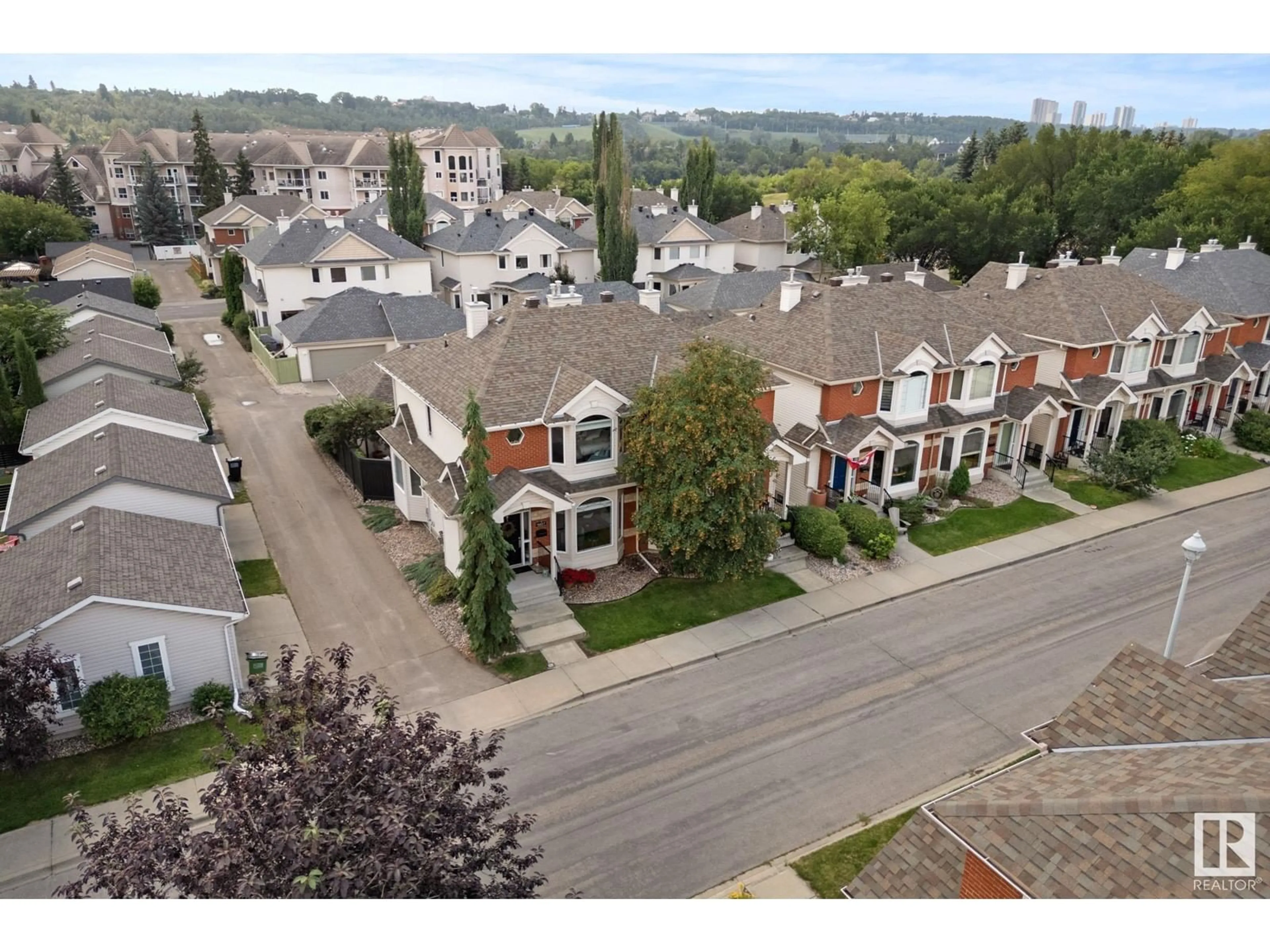 A pic from outside/outdoor area/front of a property/back of a property/a pic from drone, street for 9107 100B AV NW, Edmonton Alberta T5H4N8