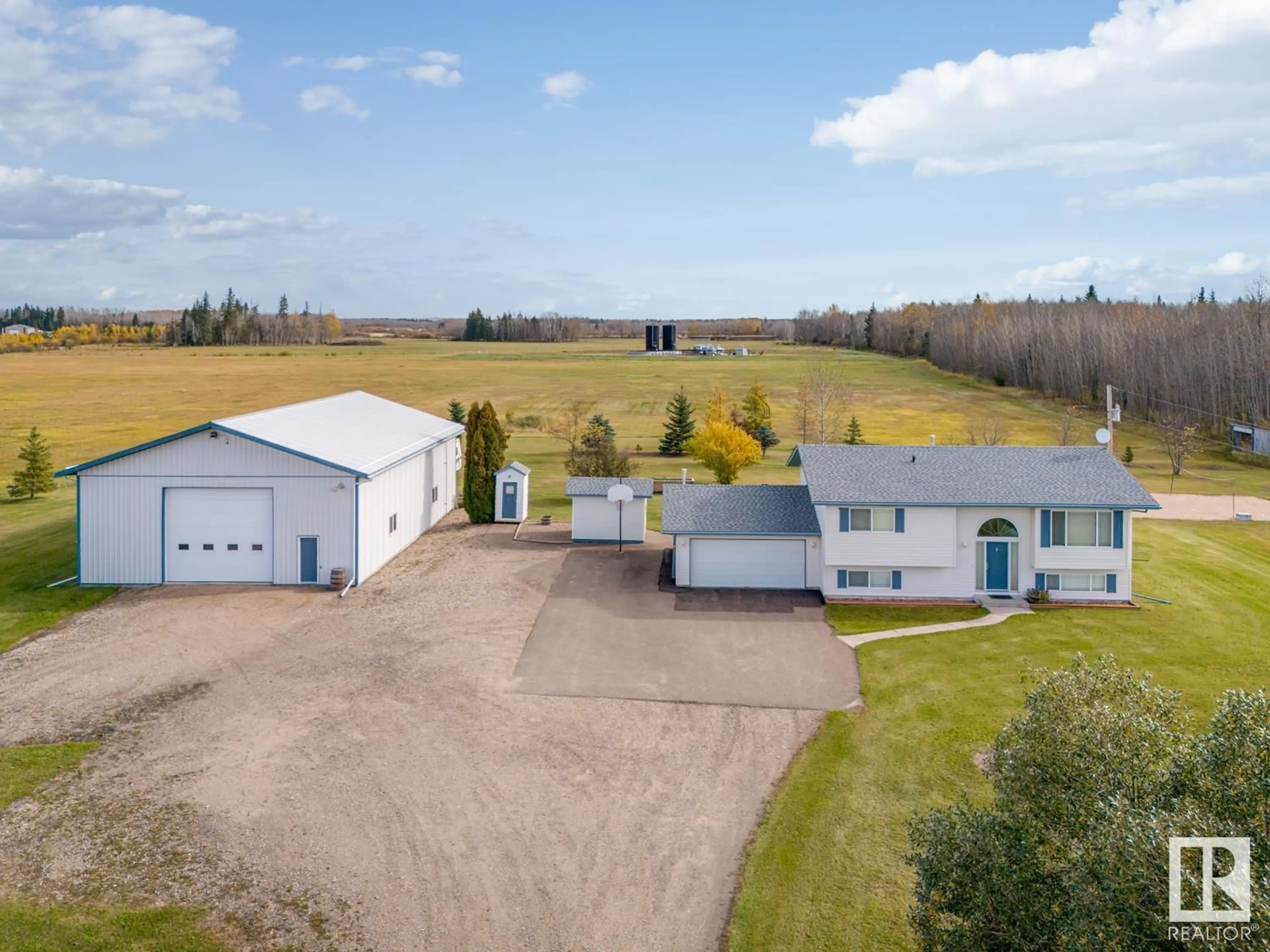 A pic from outside/outdoor area/front of a property/back of a property/a pic from drone, building for 63317 897 HI, Rural Bonnyville M.D. Alberta T9M1P1