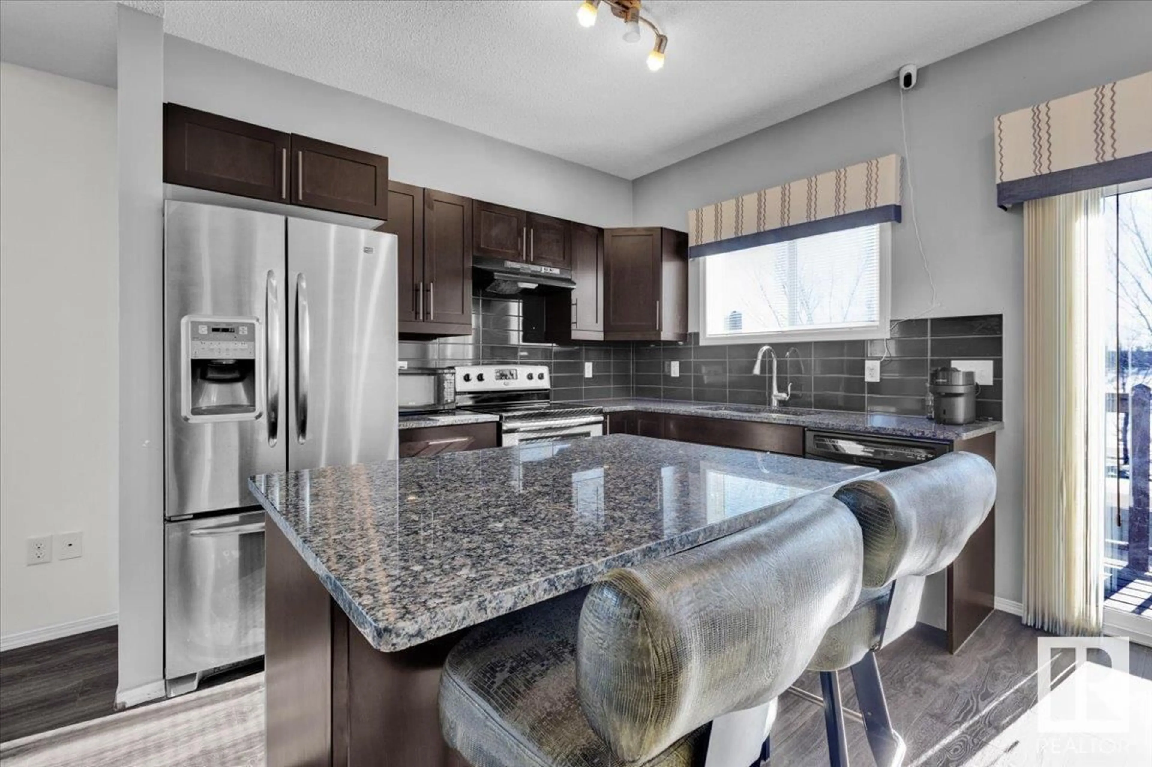 Open concept kitchen, ceramic/tile floor for #44 6520 2 AV SW, Edmonton Alberta T6X1S4