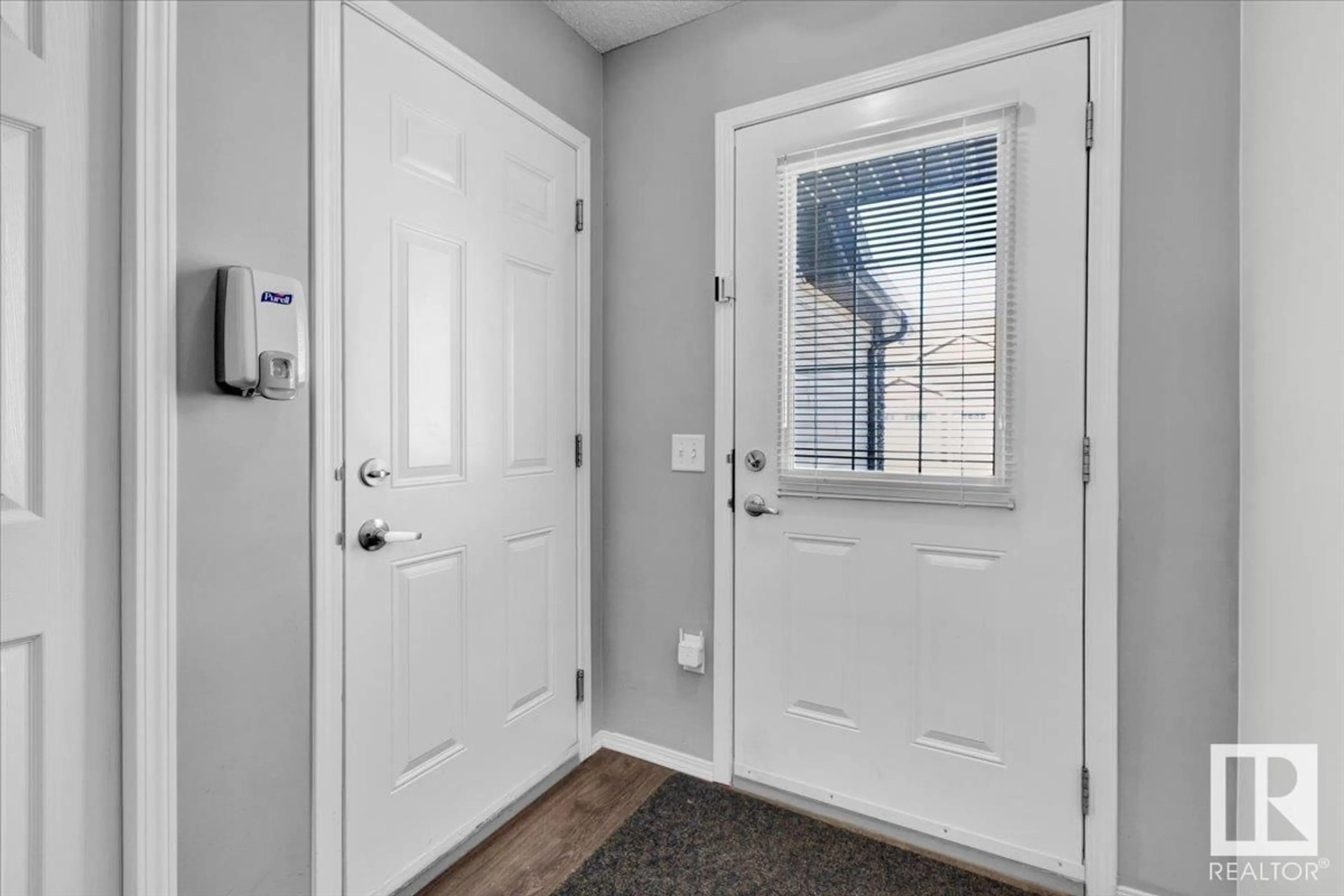 Indoor entryway for #44 6520 2 AV SW, Edmonton Alberta T6X1S4