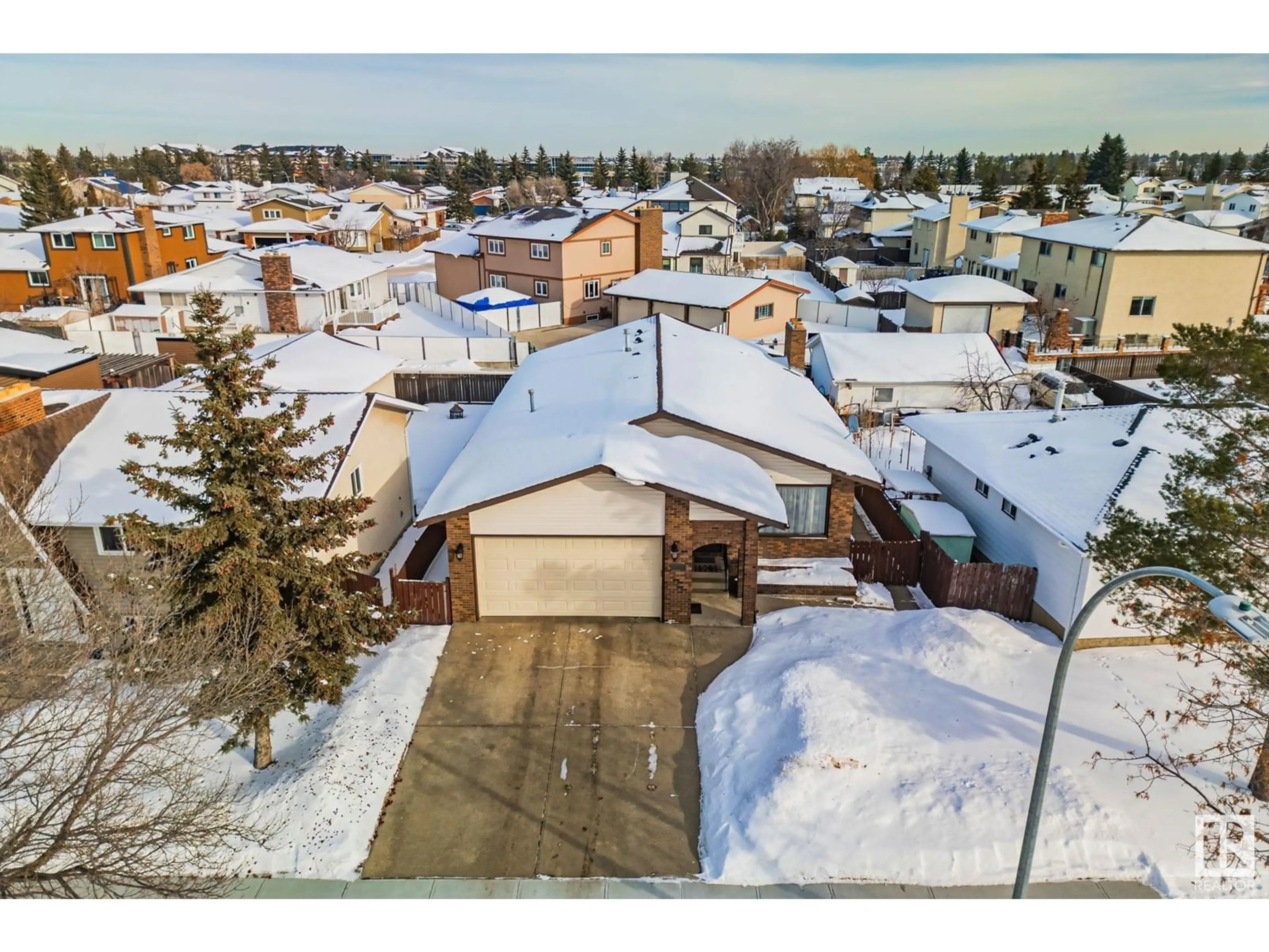 A pic from outside/outdoor area/front of a property/back of a property/a pic from drone, street for 15715 100 ST NW, Edmonton Alberta T5X4E2