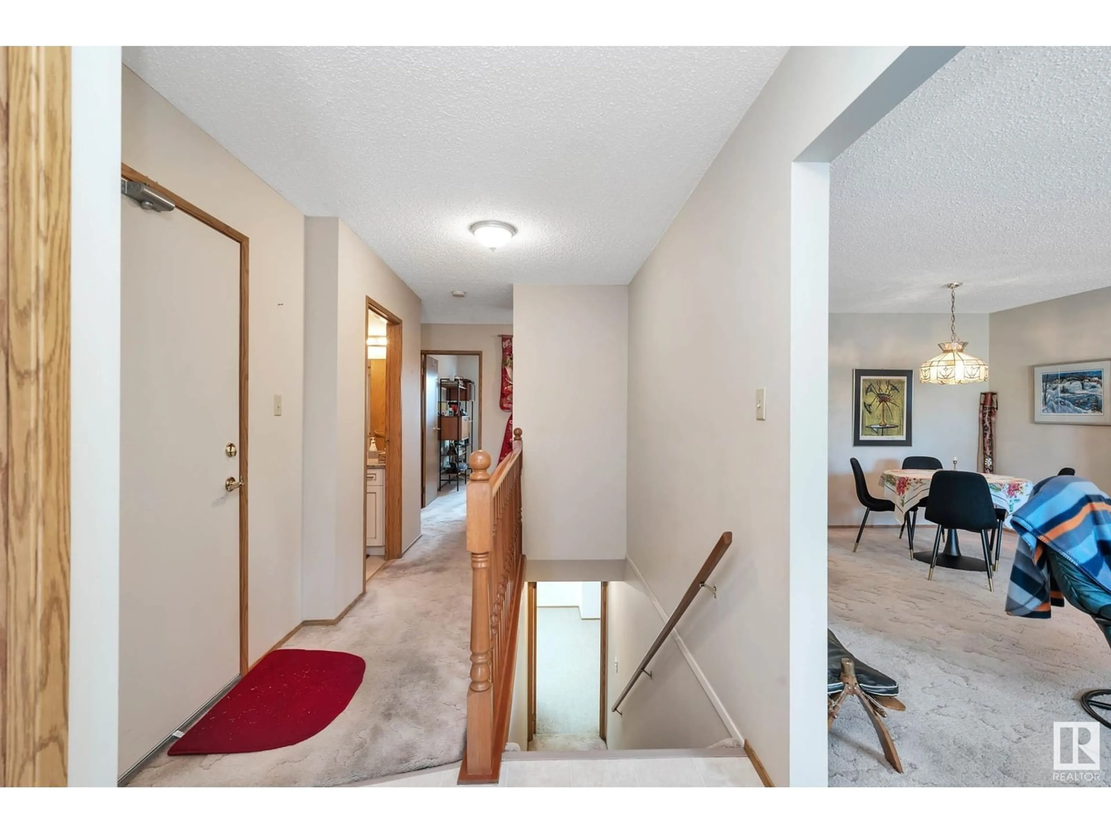 Indoor foyer for 10726 153 AV NW, Edmonton Alberta T5X5T9