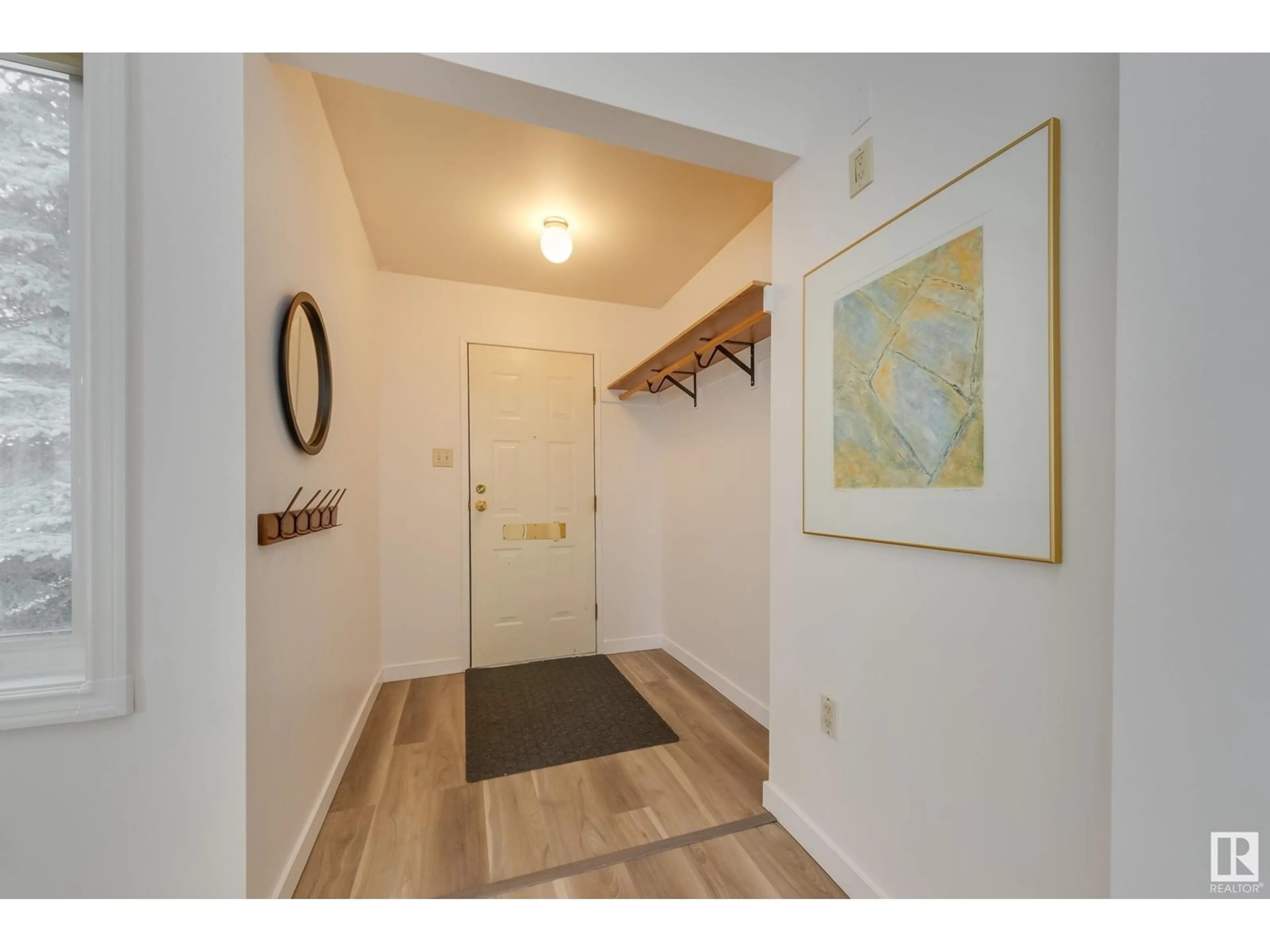 Indoor entryway for 11335 71 ST NW, Edmonton Alberta T5B1V5