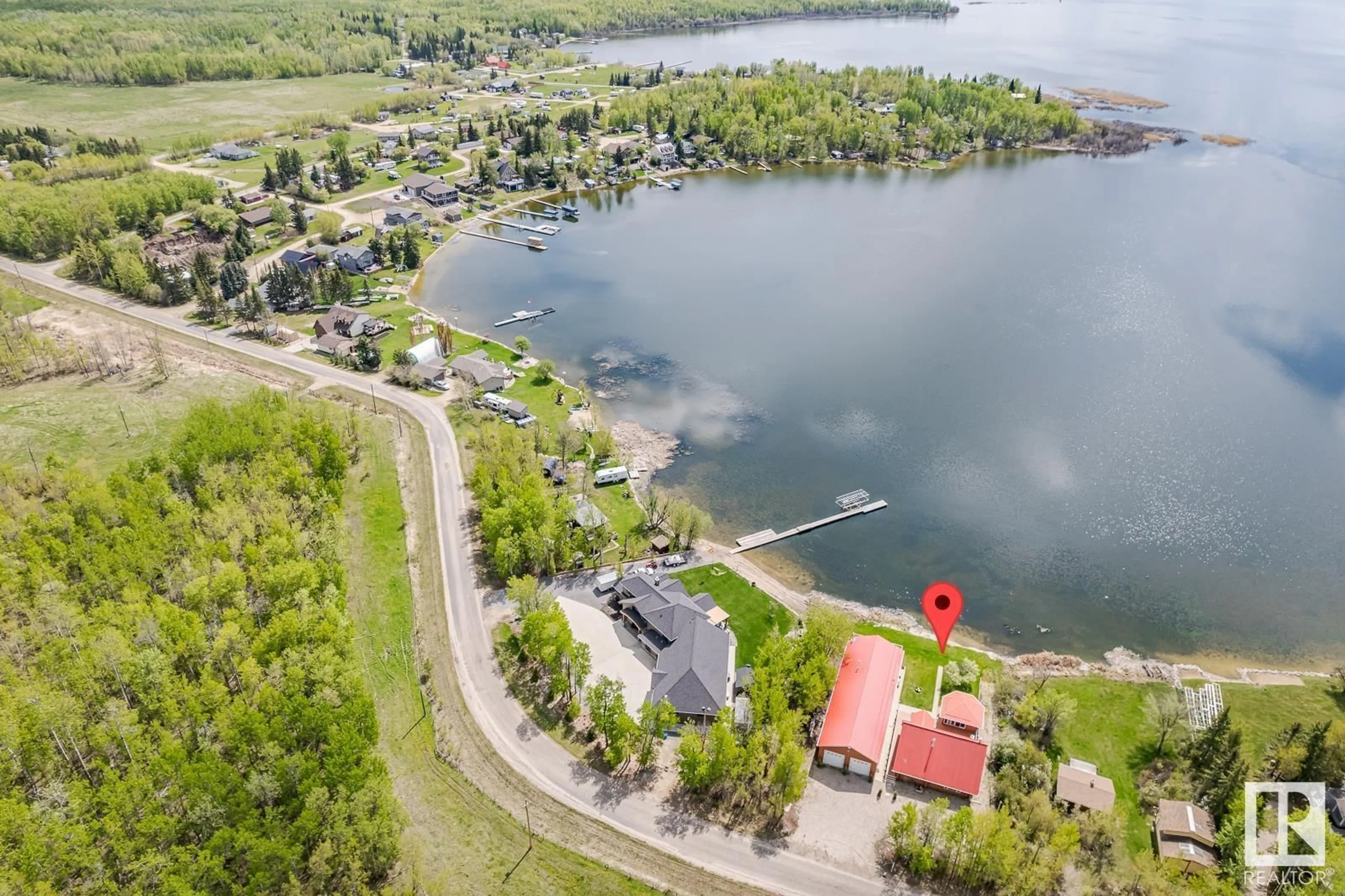 A pic from outside/outdoor area/front of a property/back of a property/a pic from drone, water/lake/river/ocean view for 3011A TWP, Rural Barrhead County Alberta T0E1A0