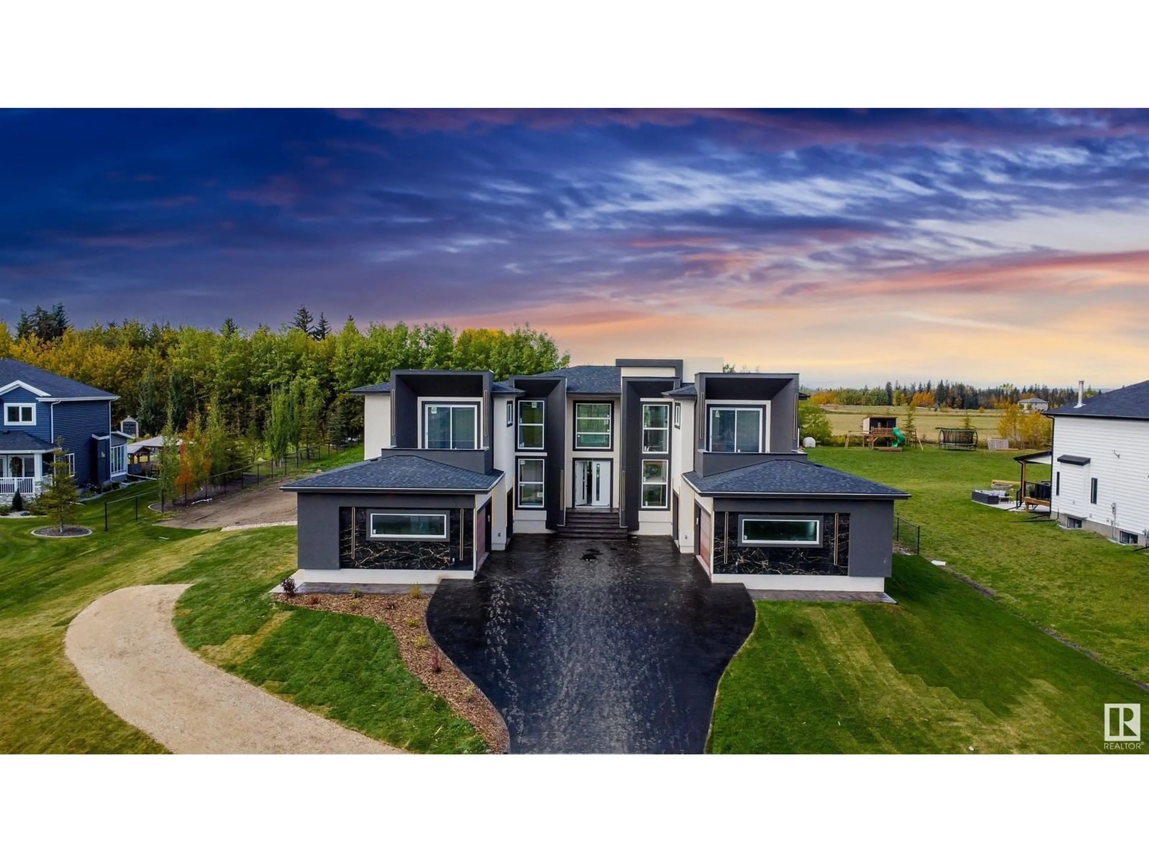 A pic from outside/outdoor area/front of a property/back of a property/a pic from drone, unknown for 48 26409 TWP RD 532a, Rural Parkland County Alberta T7X4M1