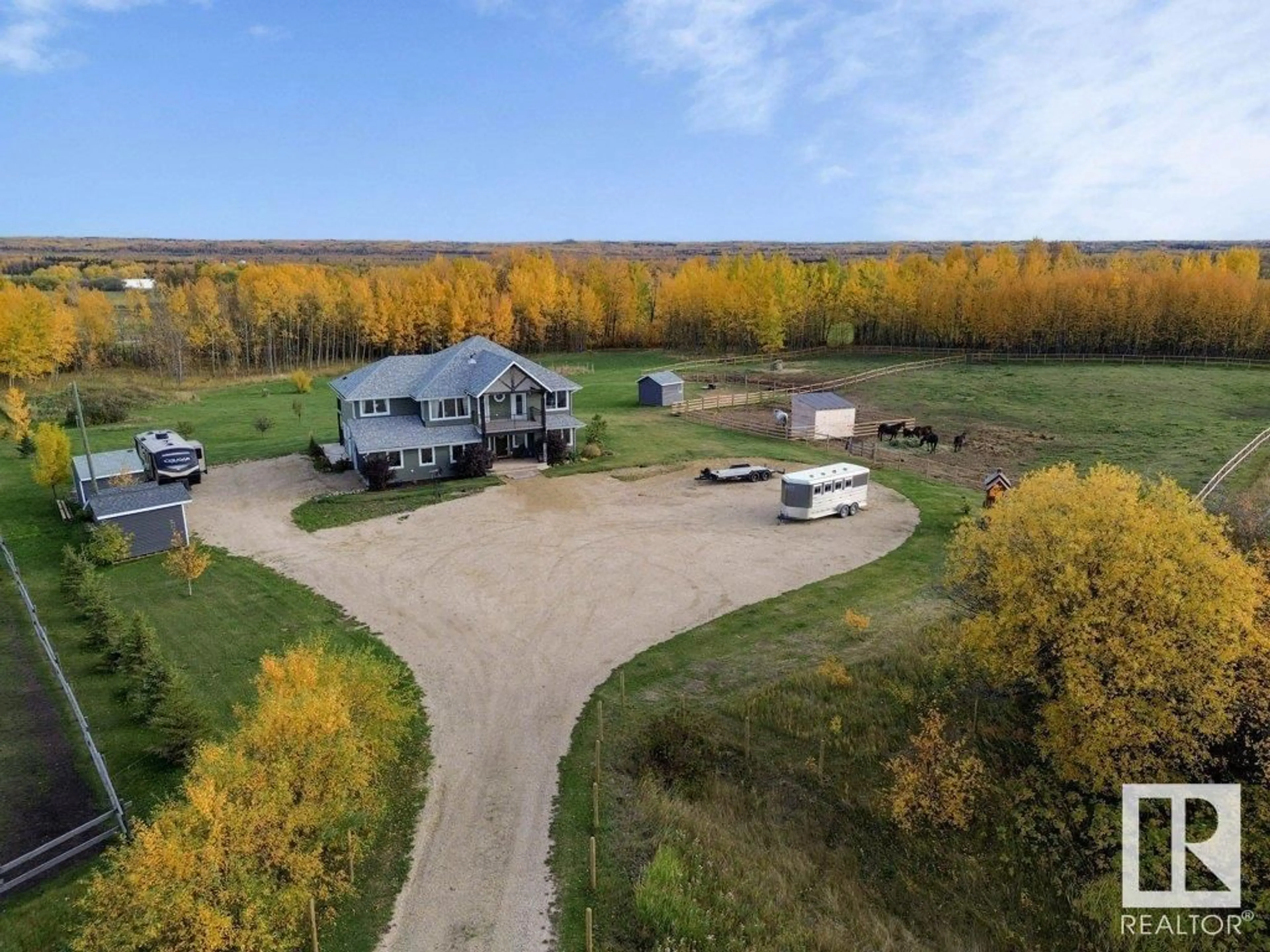A pic from outside/outdoor area/front of a property/back of a property/a pic from drone, water/lake/river/ocean view for 19a HWY 43, Rural Lac Ste. Anne County Alberta T0E1V0