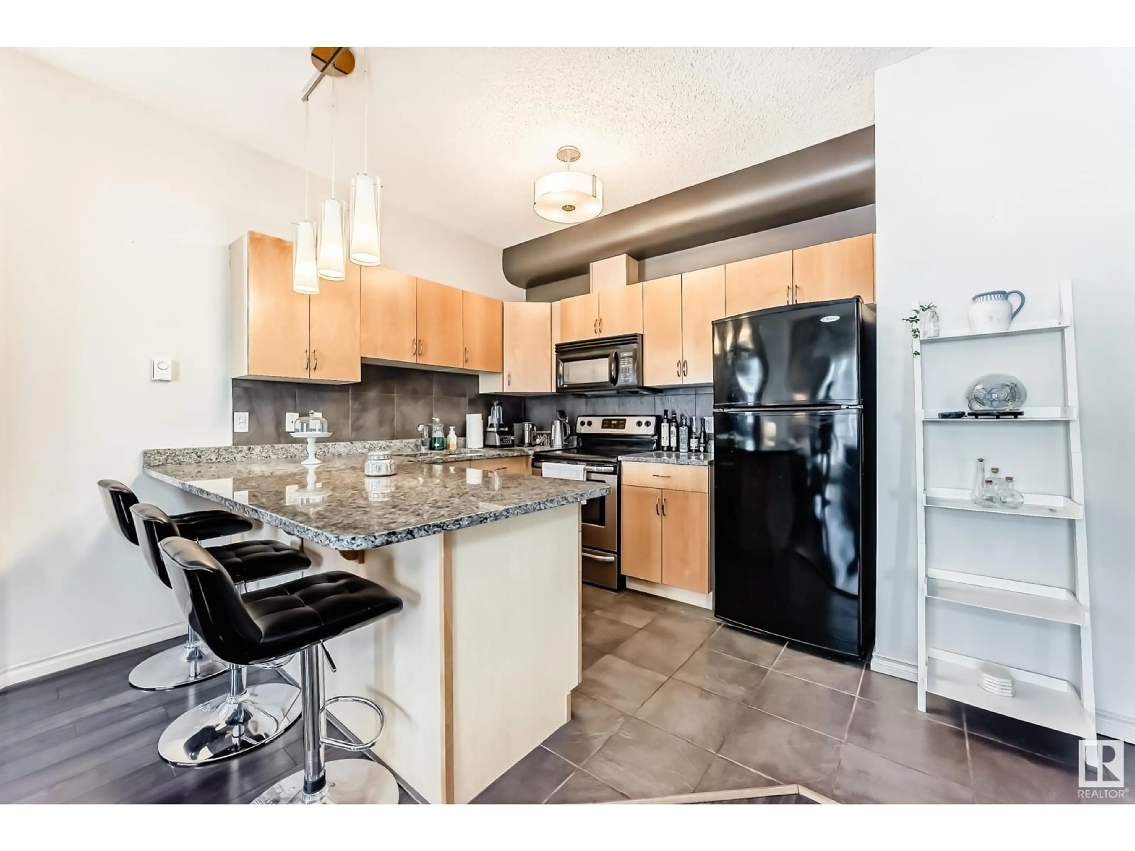 Open concept kitchen, unknown for #309 10235 112 ST NW, Edmonton Alberta T5K1M7