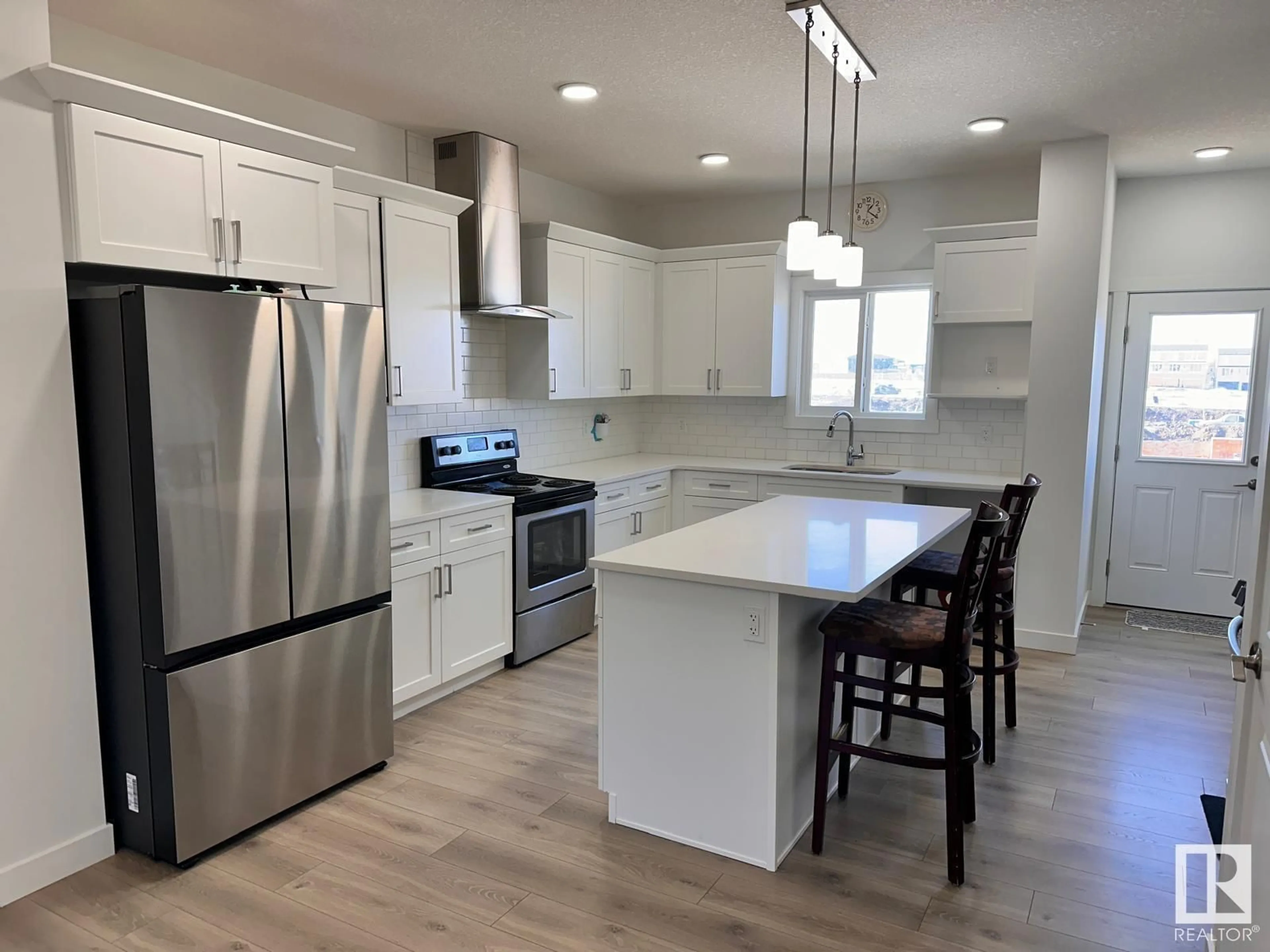 Open concept kitchen, unknown for 436 29 ST SW, Edmonton Alberta T6X3E7