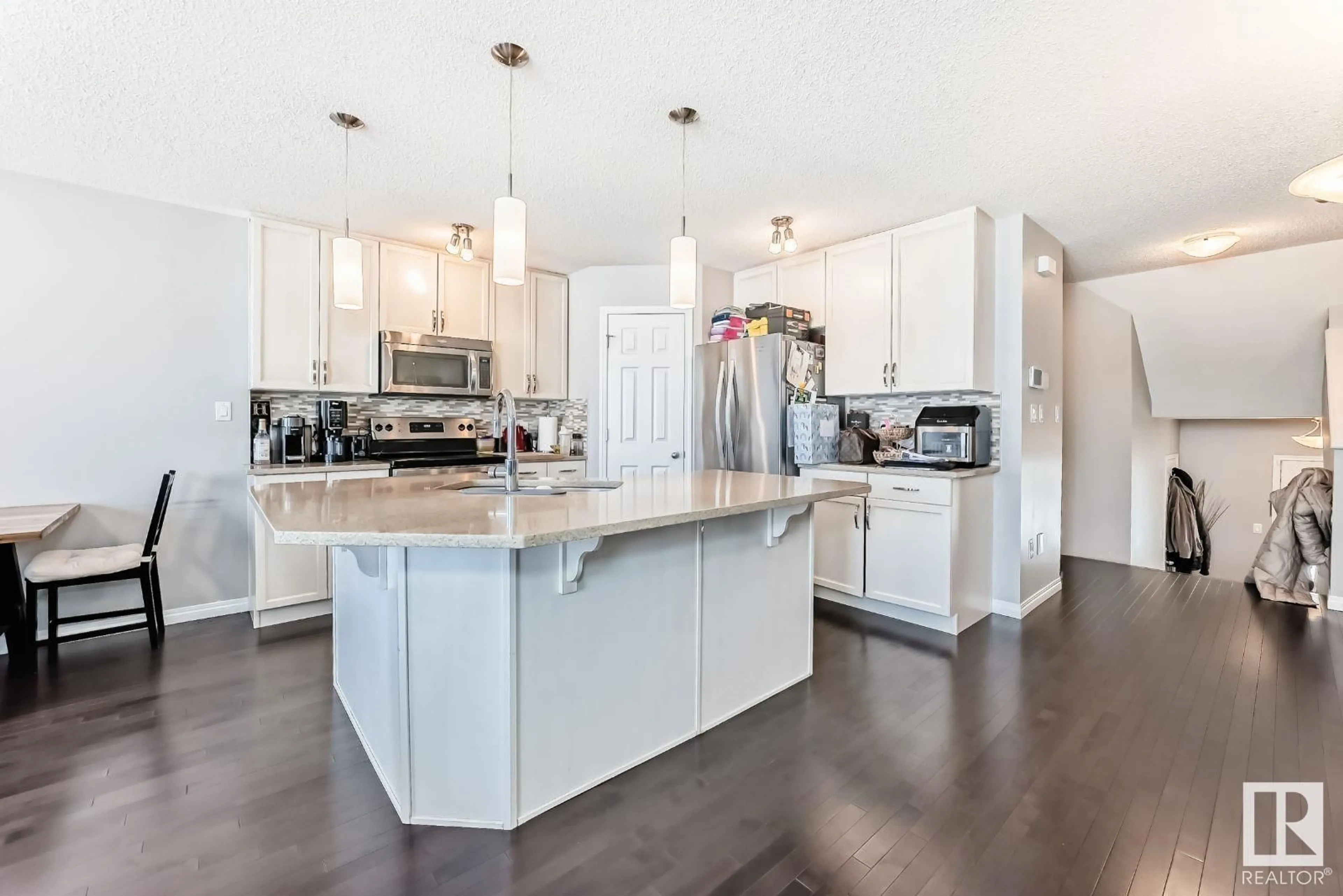 Open concept kitchen, unknown for 2303 68 ST SW, Edmonton Alberta T6X2B1