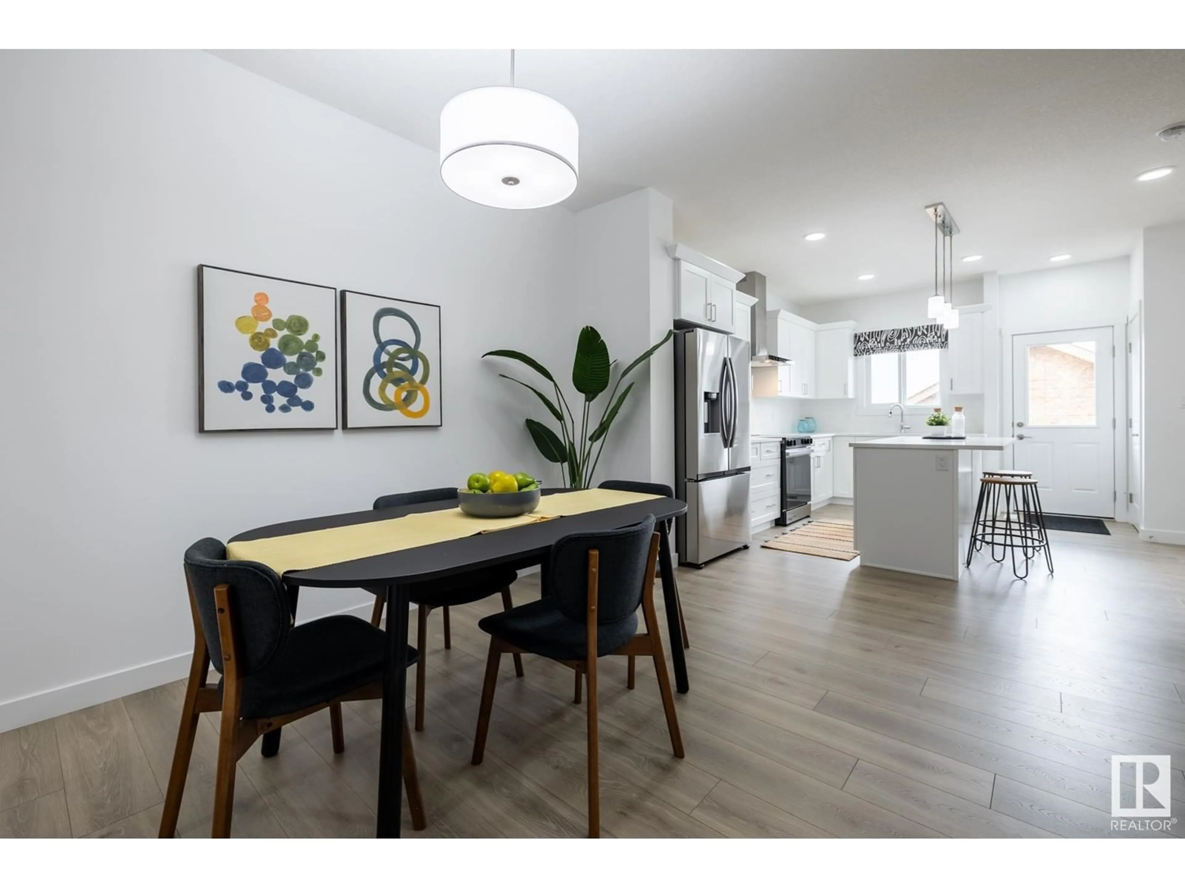 Open concept kitchen, wood/laminate floor for 1266 KESWICK DR, Edmonton Alberta T6W5P2