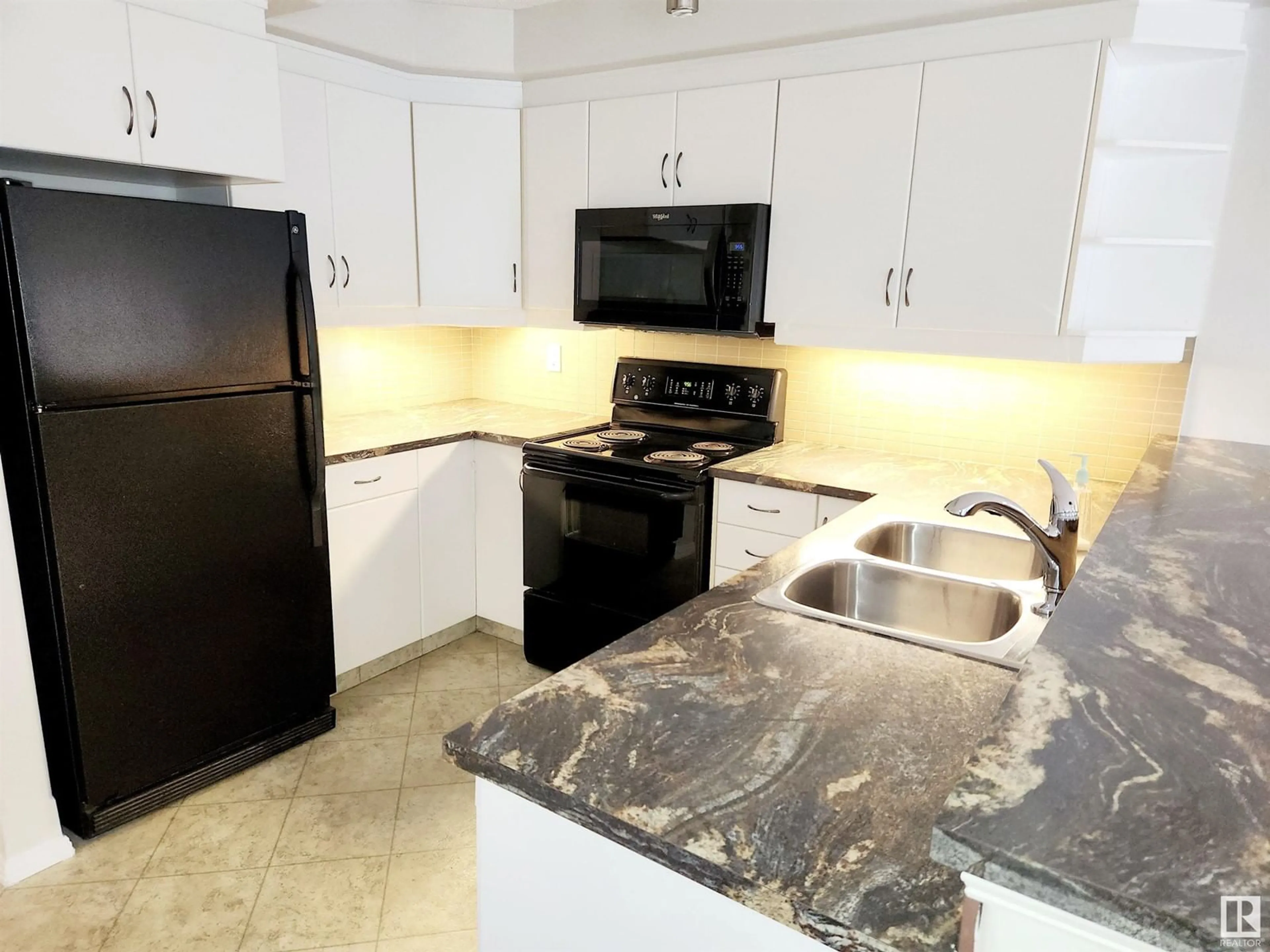 Standard kitchen, ceramic/tile floor for #134 9704 174 ST NW, Edmonton Alberta T5T6J4