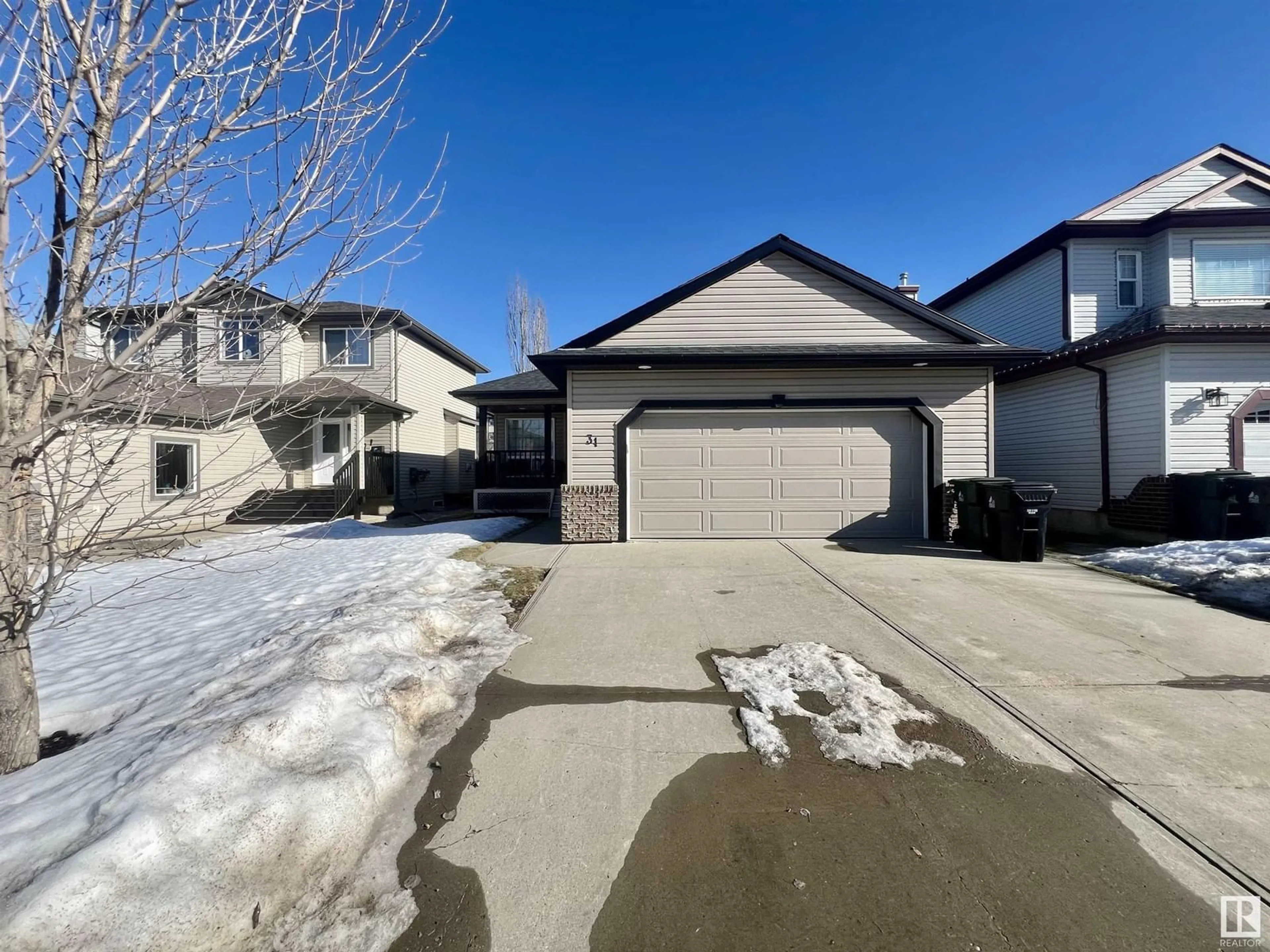 A pic from outside/outdoor area/front of a property/back of a property/a pic from drone, street for 31 LAMPLIGHT CV, Spruce Grove Alberta T7X4R2