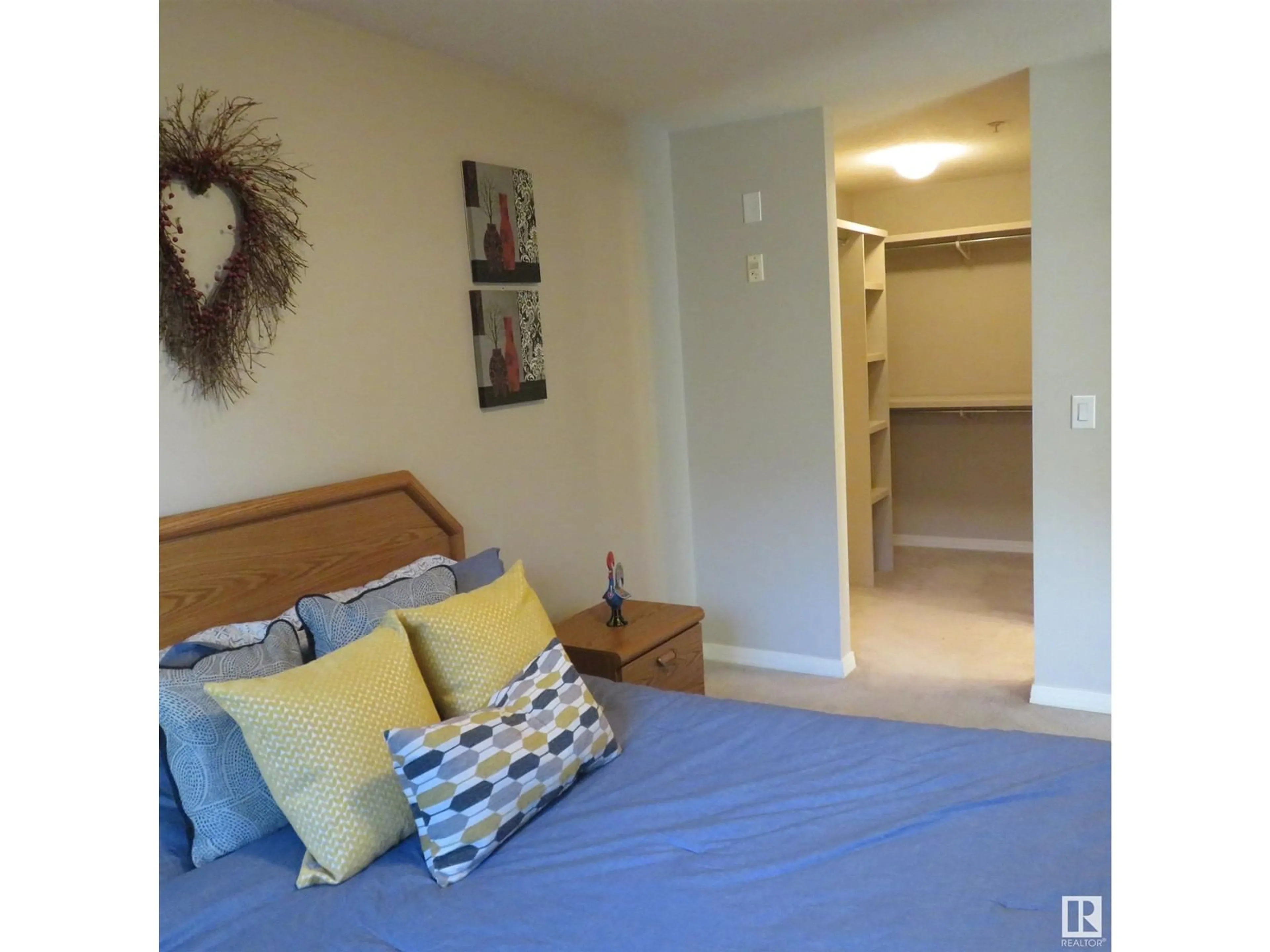 Bedroom with bed, unknown for #117 5005 165 AV NW, Edmonton Alberta T5Y0L8