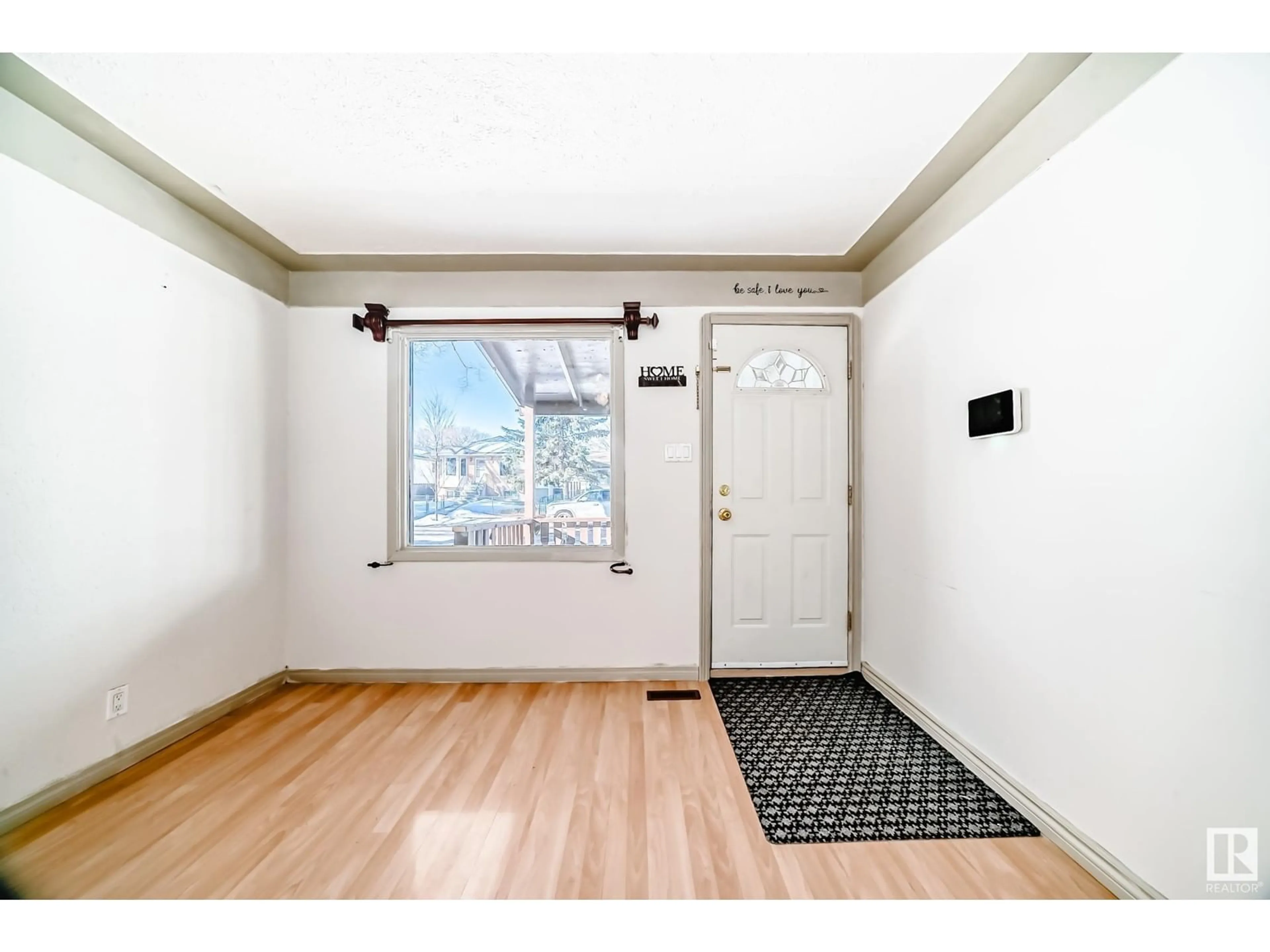 Indoor entryway for 12241 95 ST NW, Edmonton Alberta T5G1N1