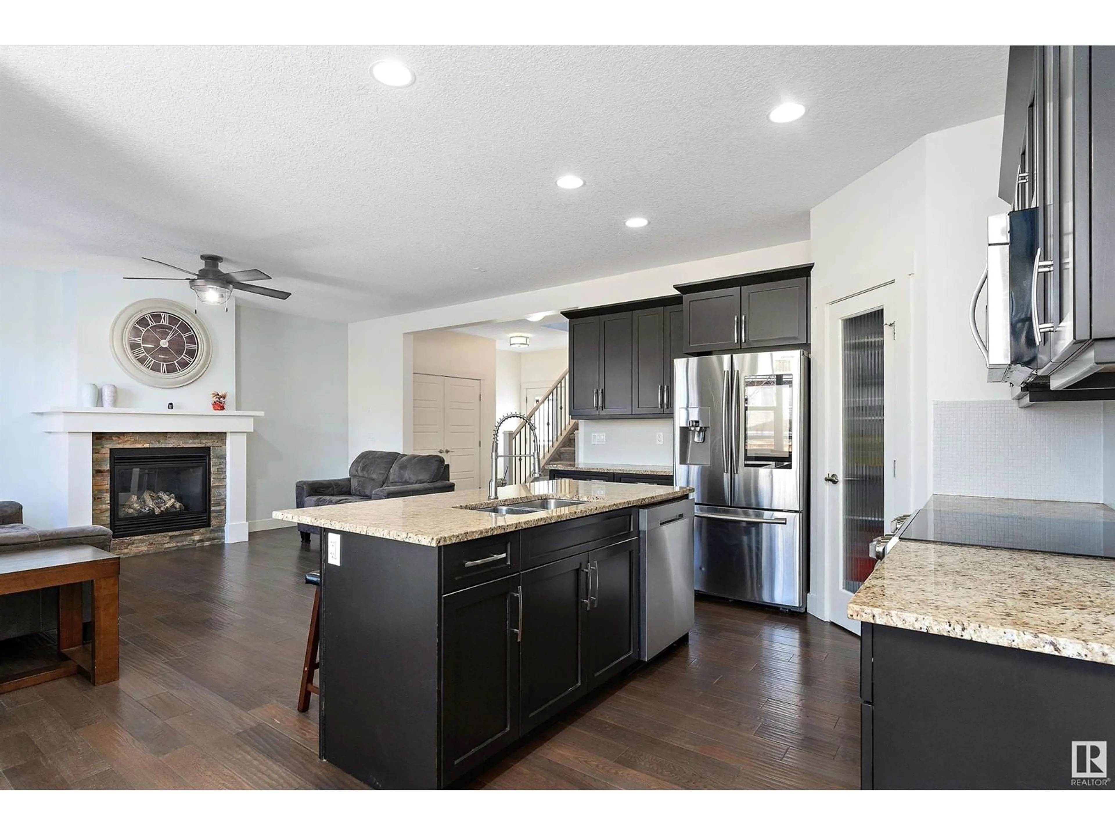 Open concept kitchen, wood/laminate floor for 124 HILLDOWNS DR, Spruce Grove Alberta T7X0J1