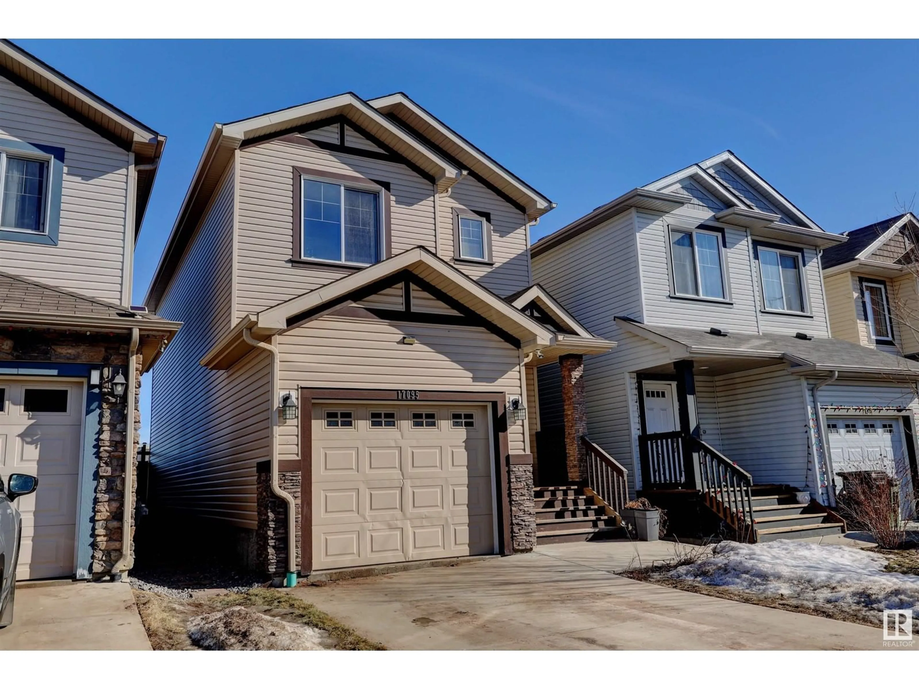 Home with vinyl exterior material, street for 17095 38 ST NW, Edmonton Alberta T5Y3R8