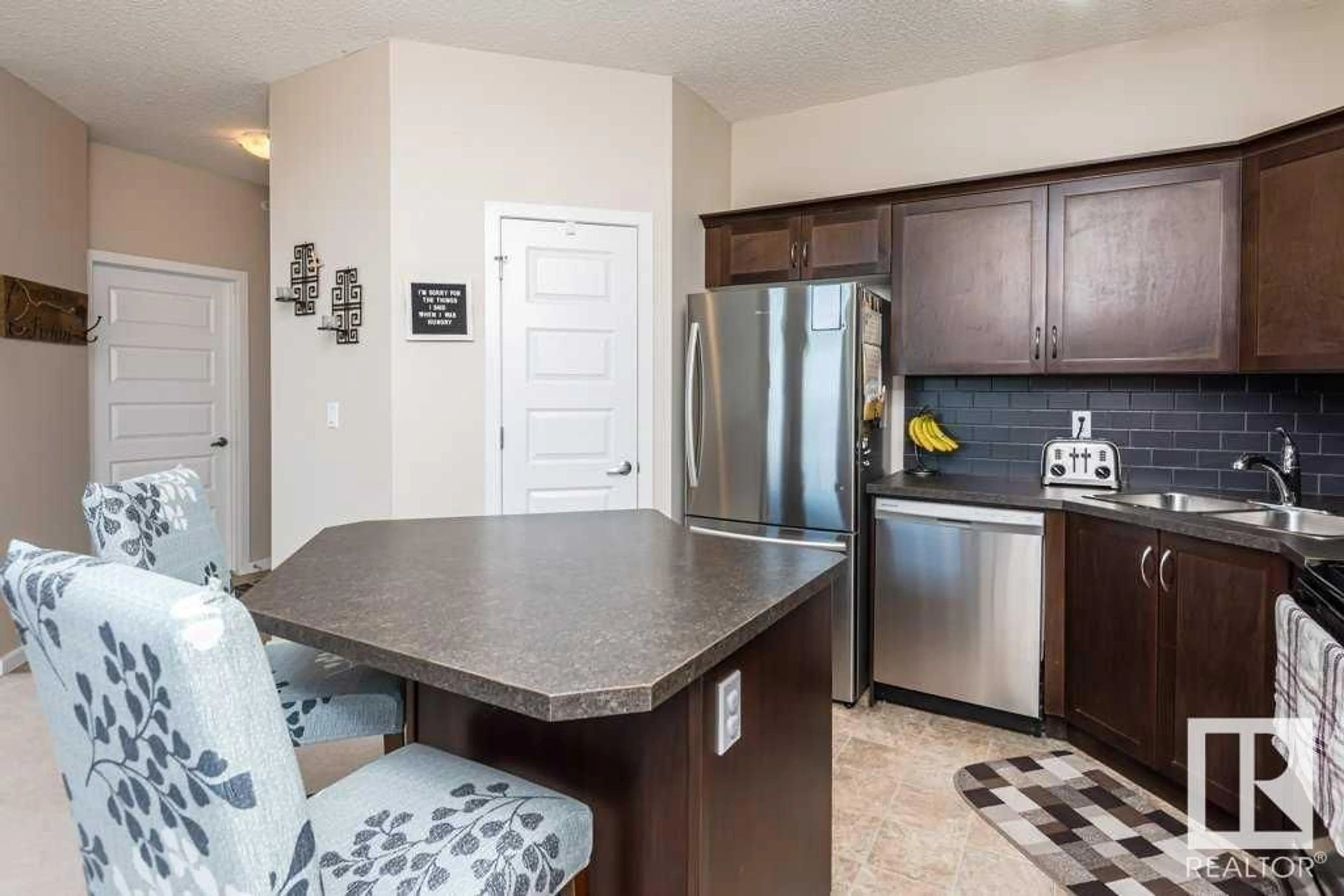 Open concept kitchen, ceramic/tile floor for #415 400 Silver Berry RD NW, Edmonton Alberta T6T0H1