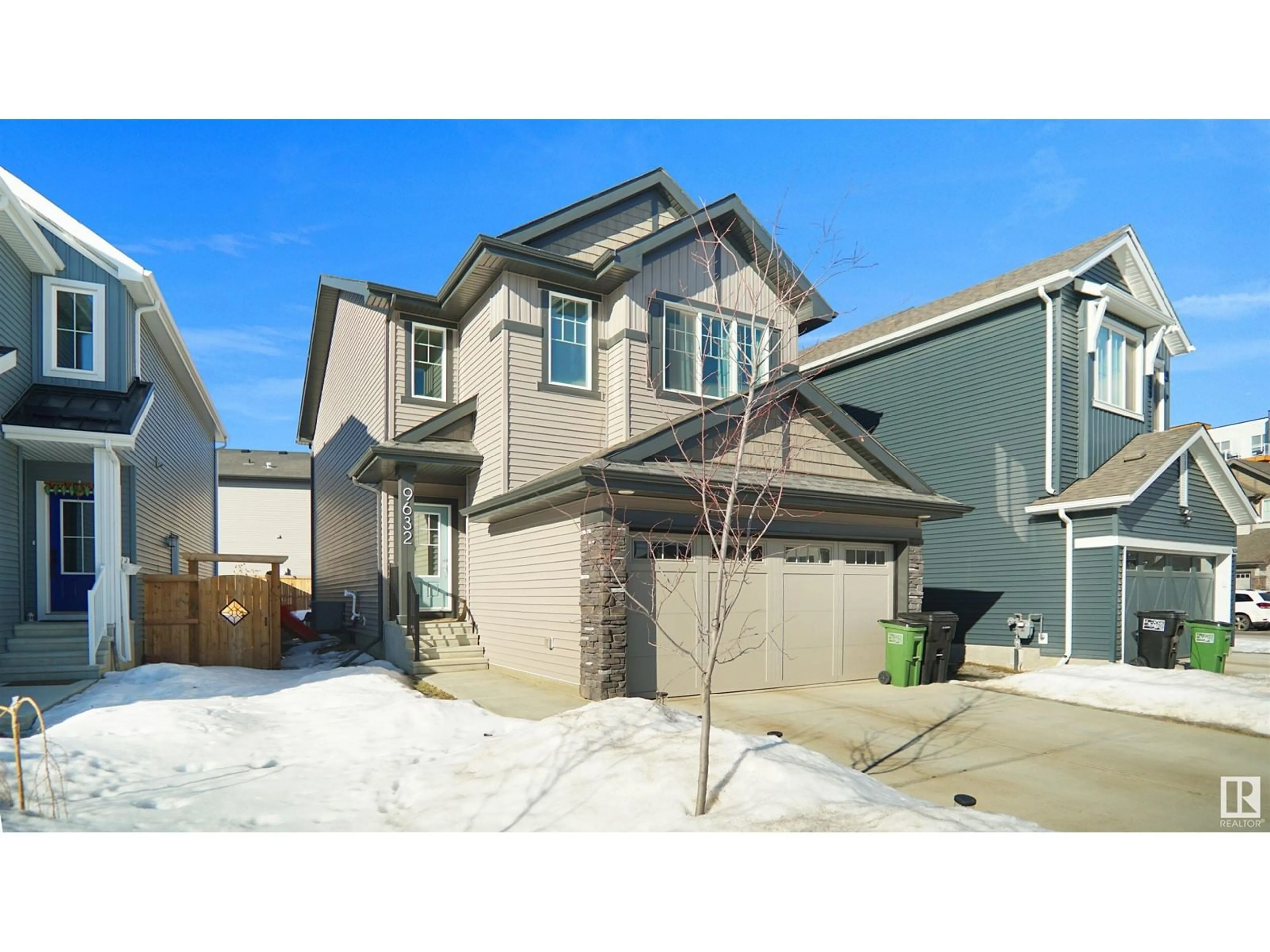 Home with vinyl exterior material, street for 9632 230 ST NW, Edmonton Alberta T5T7R3