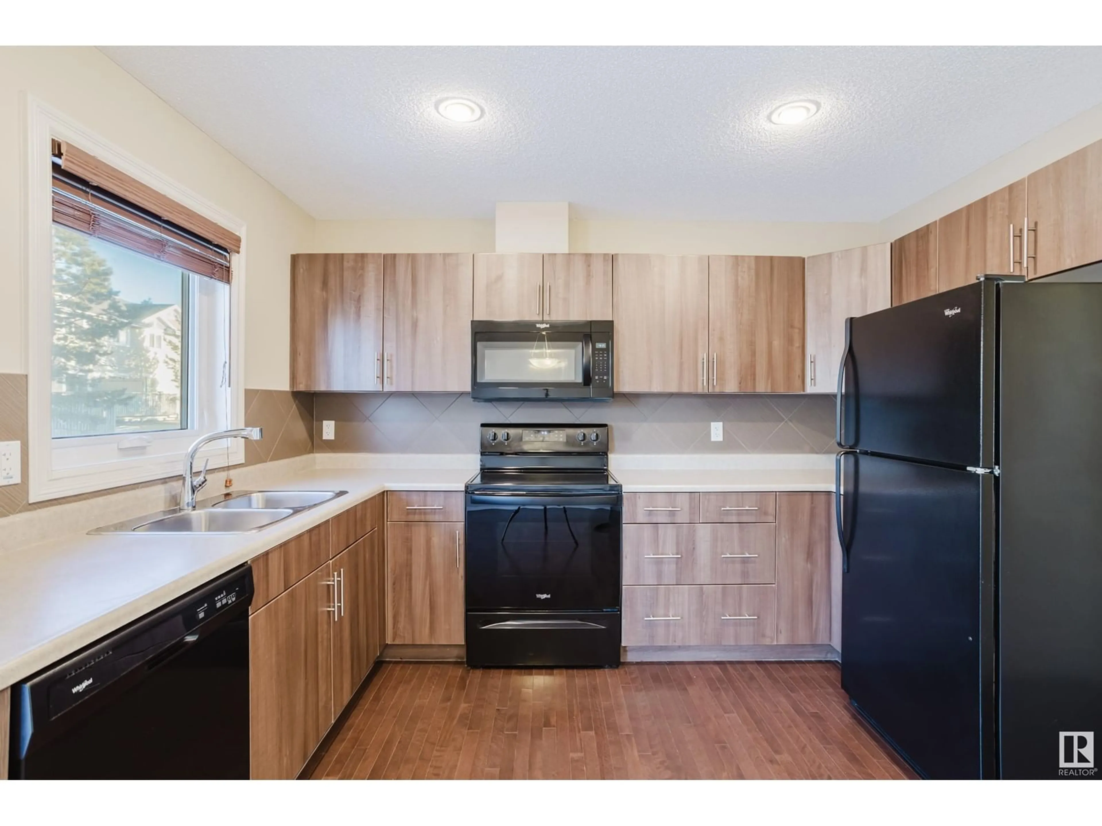 Standard kitchen, wood/laminate floor for #135 219 CHARLOTTE WY, Sherwood Park Alberta T8H0T3