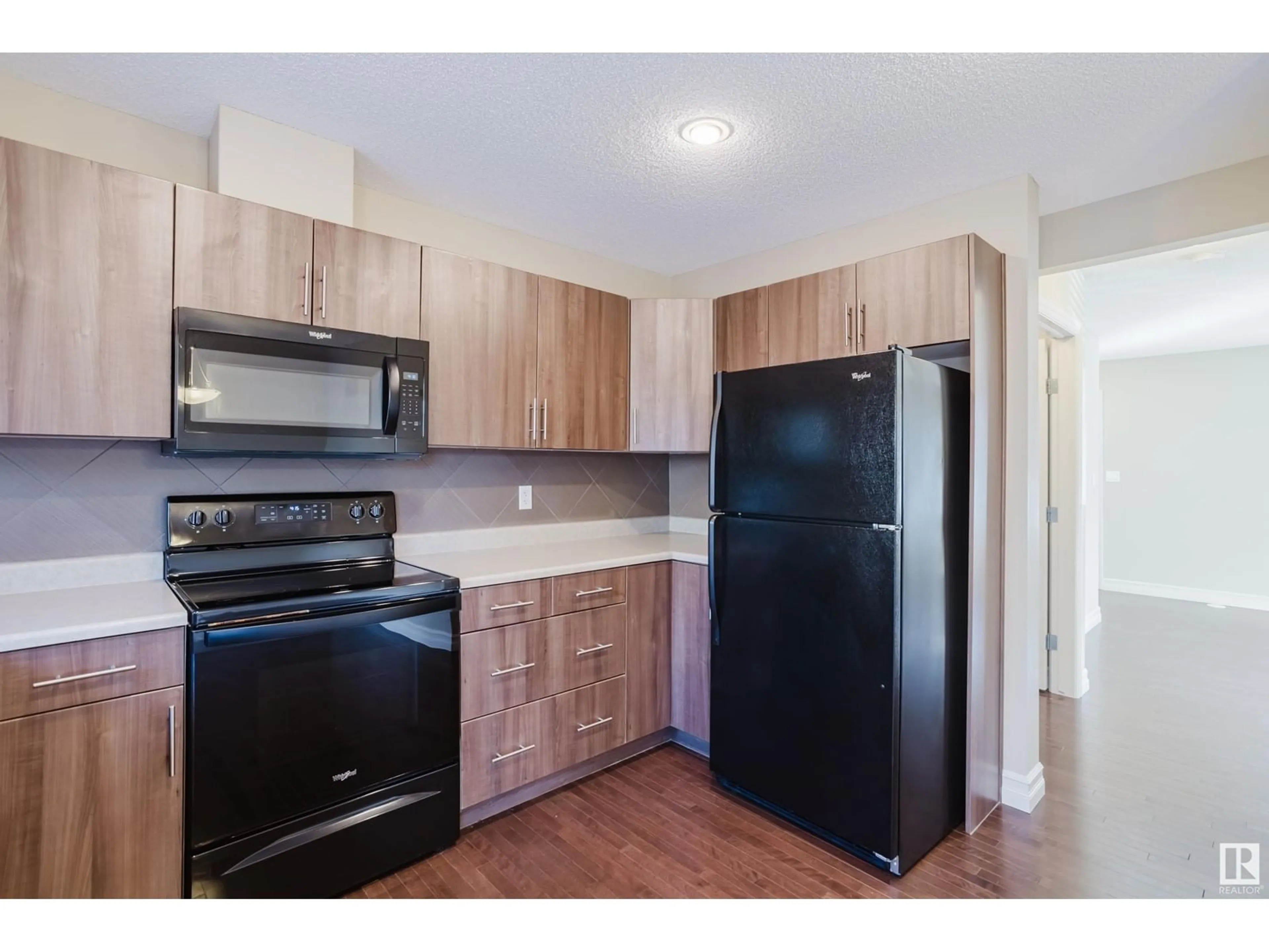 Standard kitchen, wood/laminate floor for #135 219 CHARLOTTE WY, Sherwood Park Alberta T8H0T3