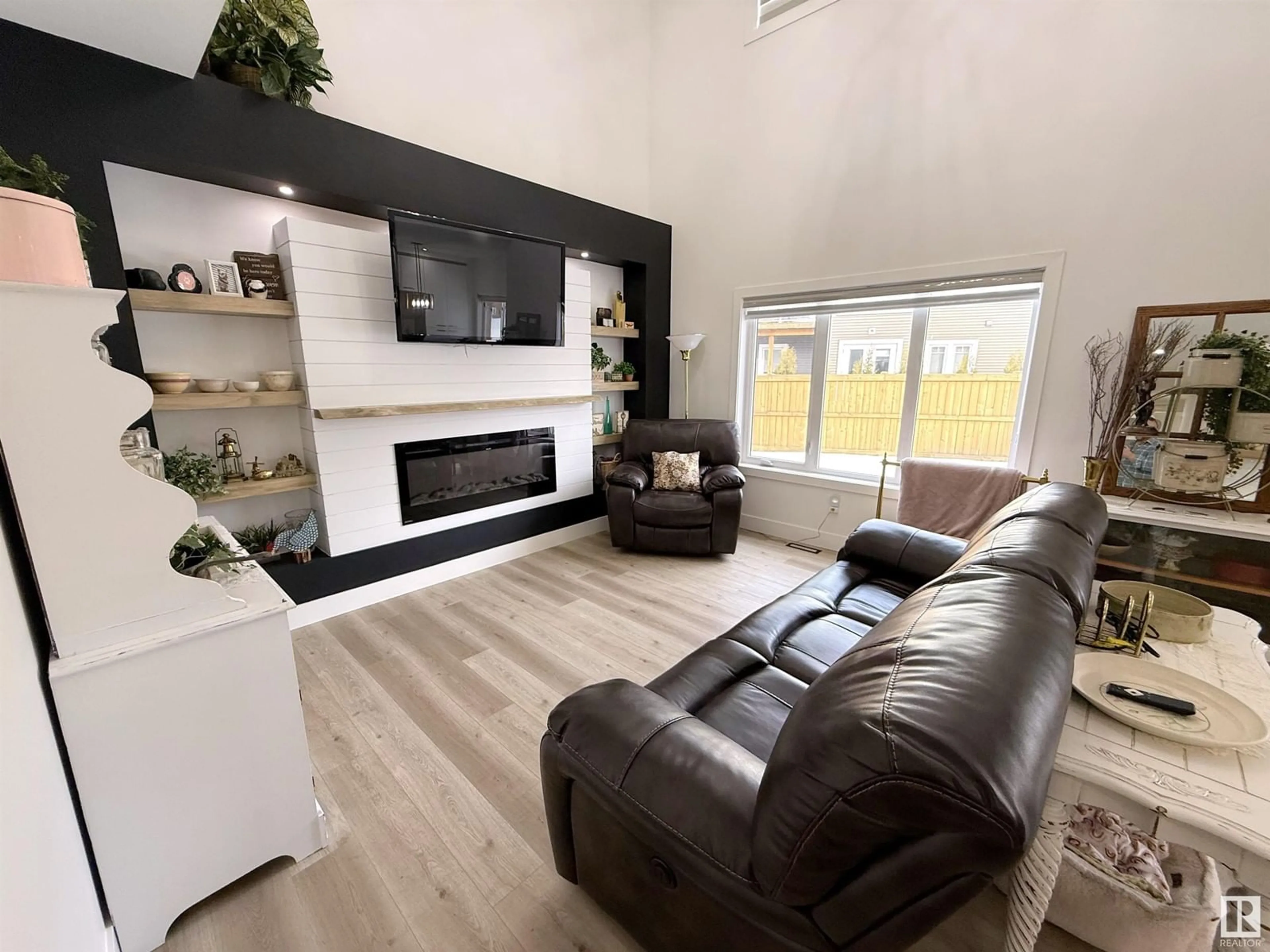 Living room with furniture, wood/laminate floor for 1725 WESTERRA LO, Stony Plain Alberta T7Z0K8