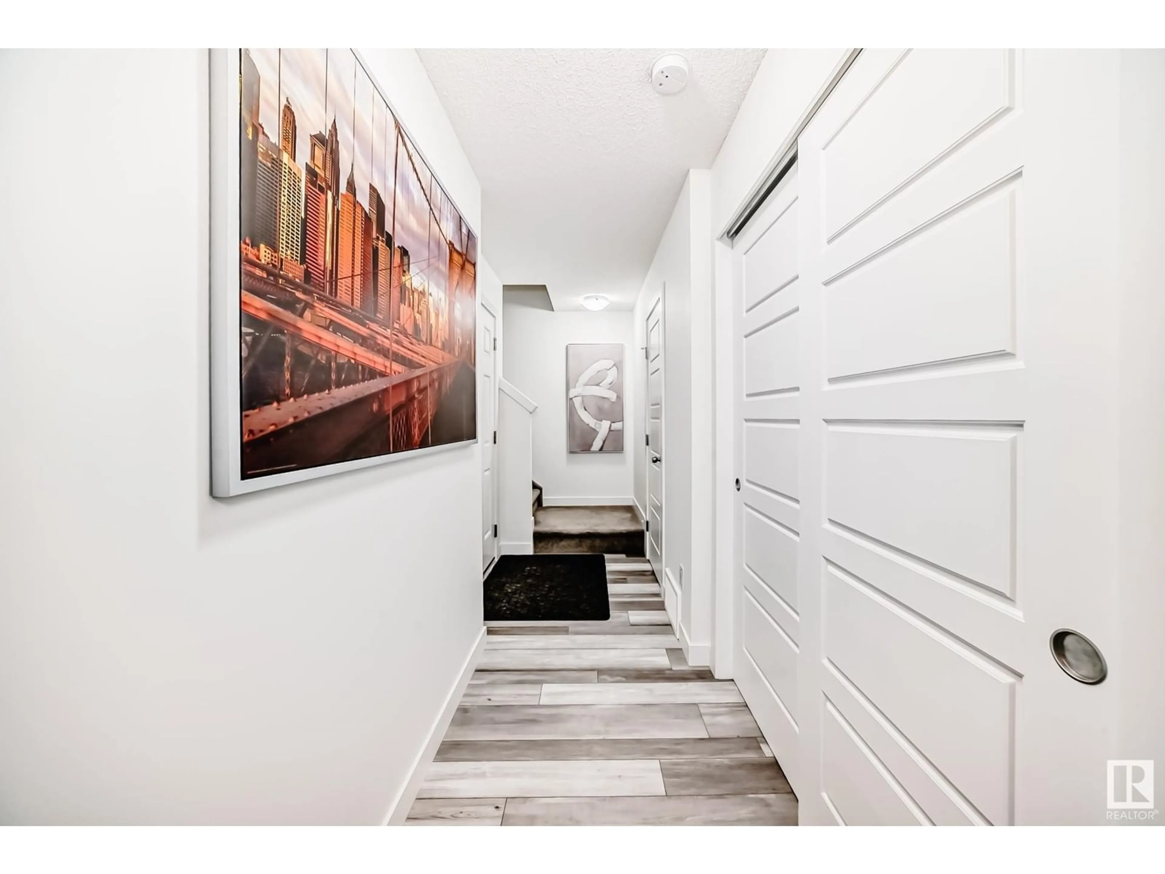 Indoor entryway for 20303 16 AV NW, Edmonton Alberta T6M1K8