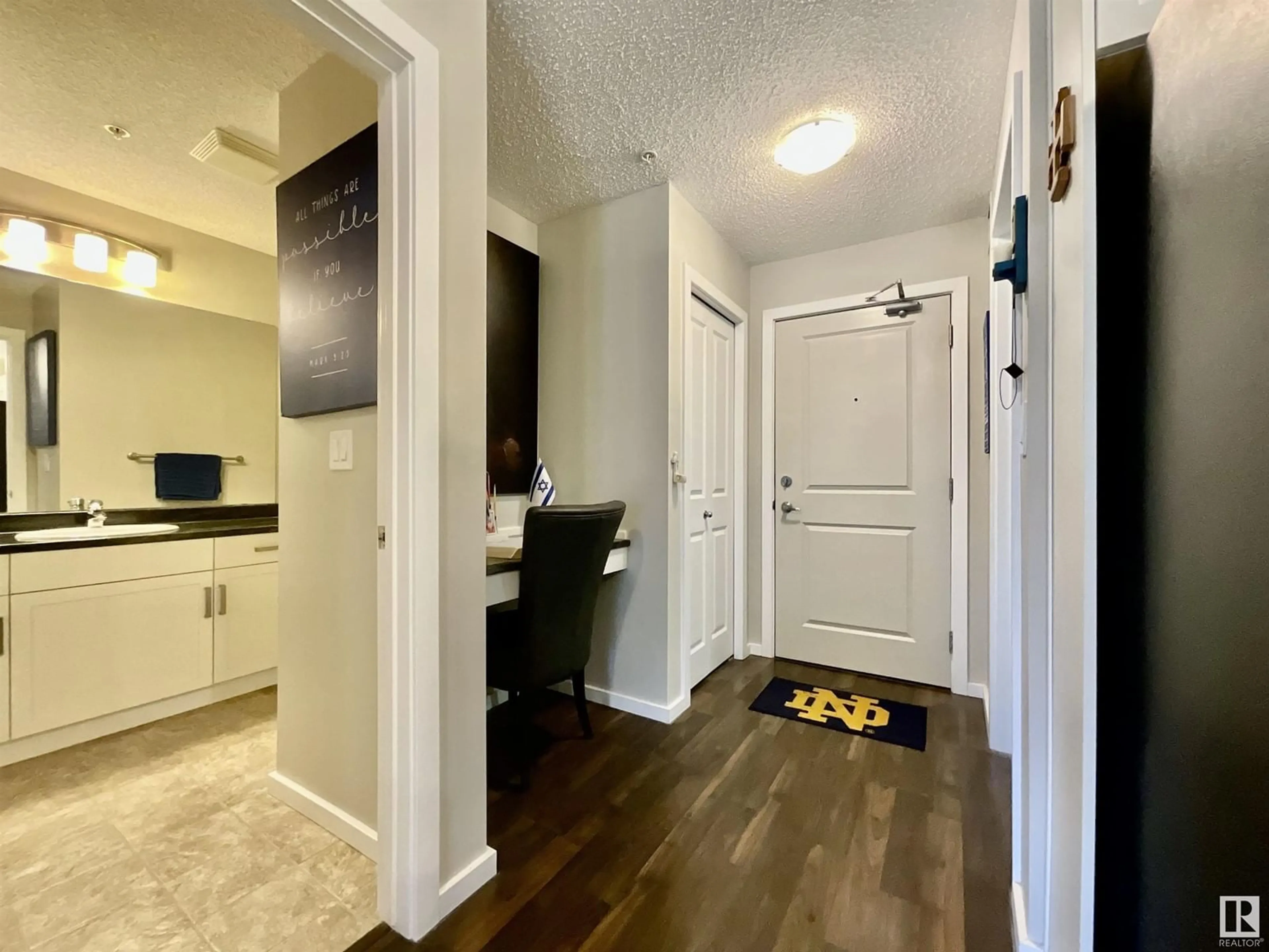 Indoor entryway for #205 5521 7 AV SW, Edmonton Alberta T5M1Y9