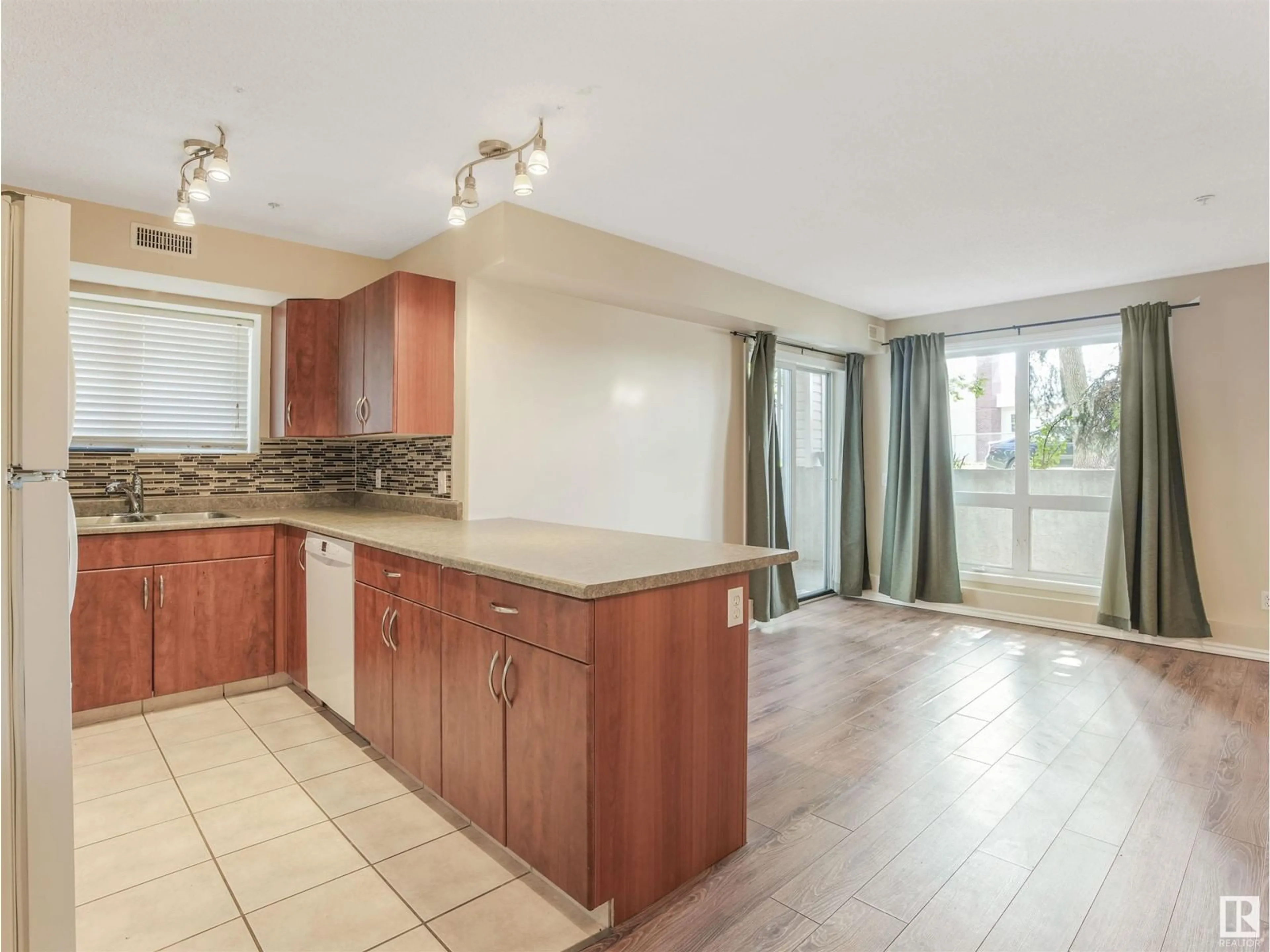 Open concept kitchen, unknown for #101 10528 77 AV NW, Edmonton Alberta T6E1N1