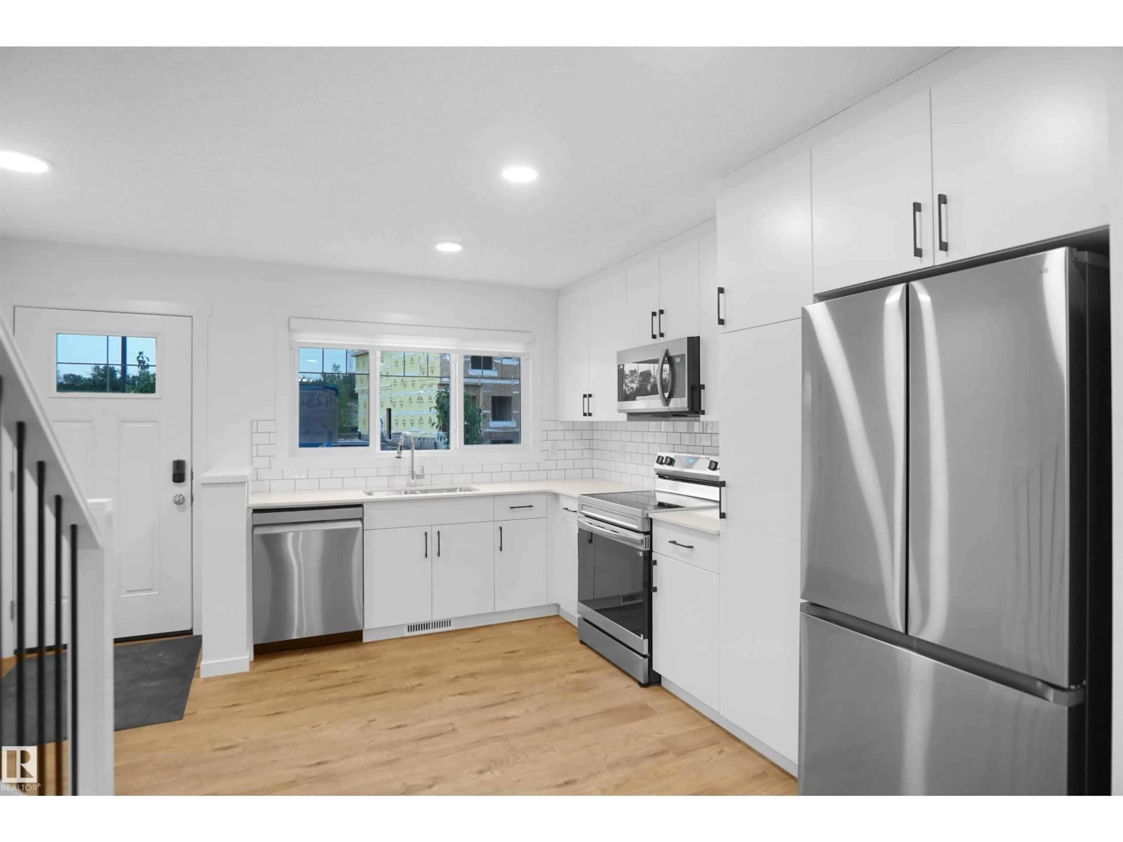 Open concept kitchen, unknown for NW - 2027 210 ST, Edmonton Alberta T6M2P5