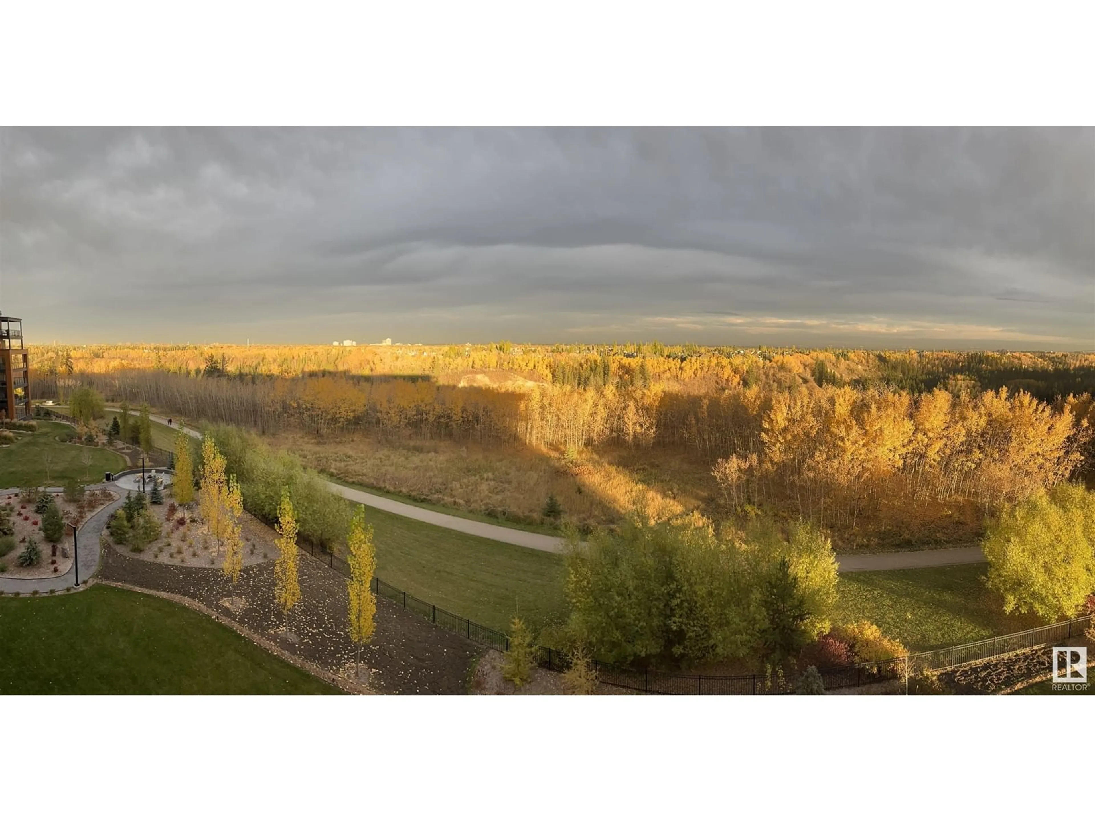 A pic from outside/outdoor area/front of a property/back of a property/a pic from drone, forest/trees view for #515 7463 MAY CM NW, Edmonton Alberta T6R0X1