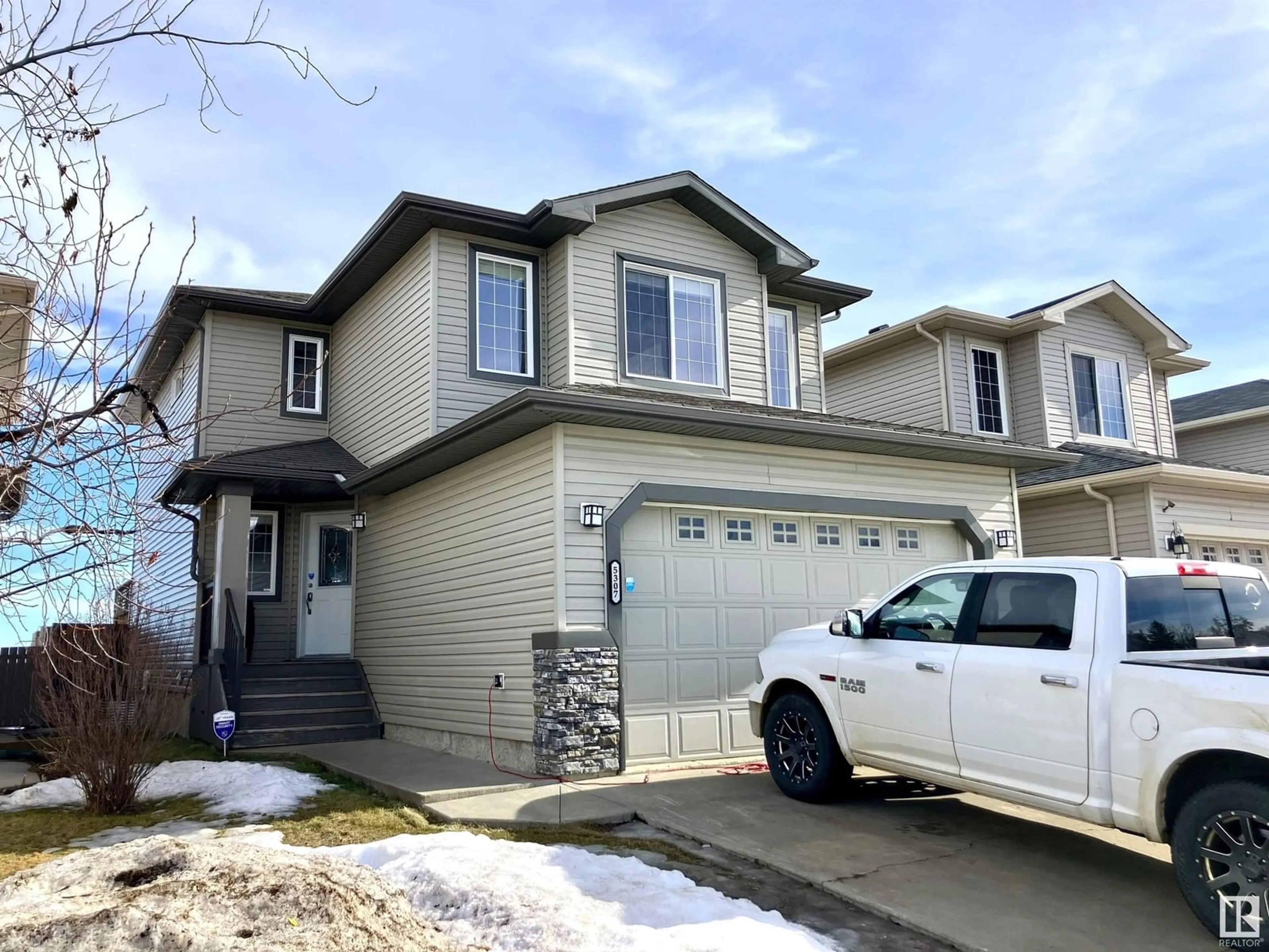 Home with vinyl exterior material, street for 5307 45 ST, Bruderheim Alberta T0B0S0