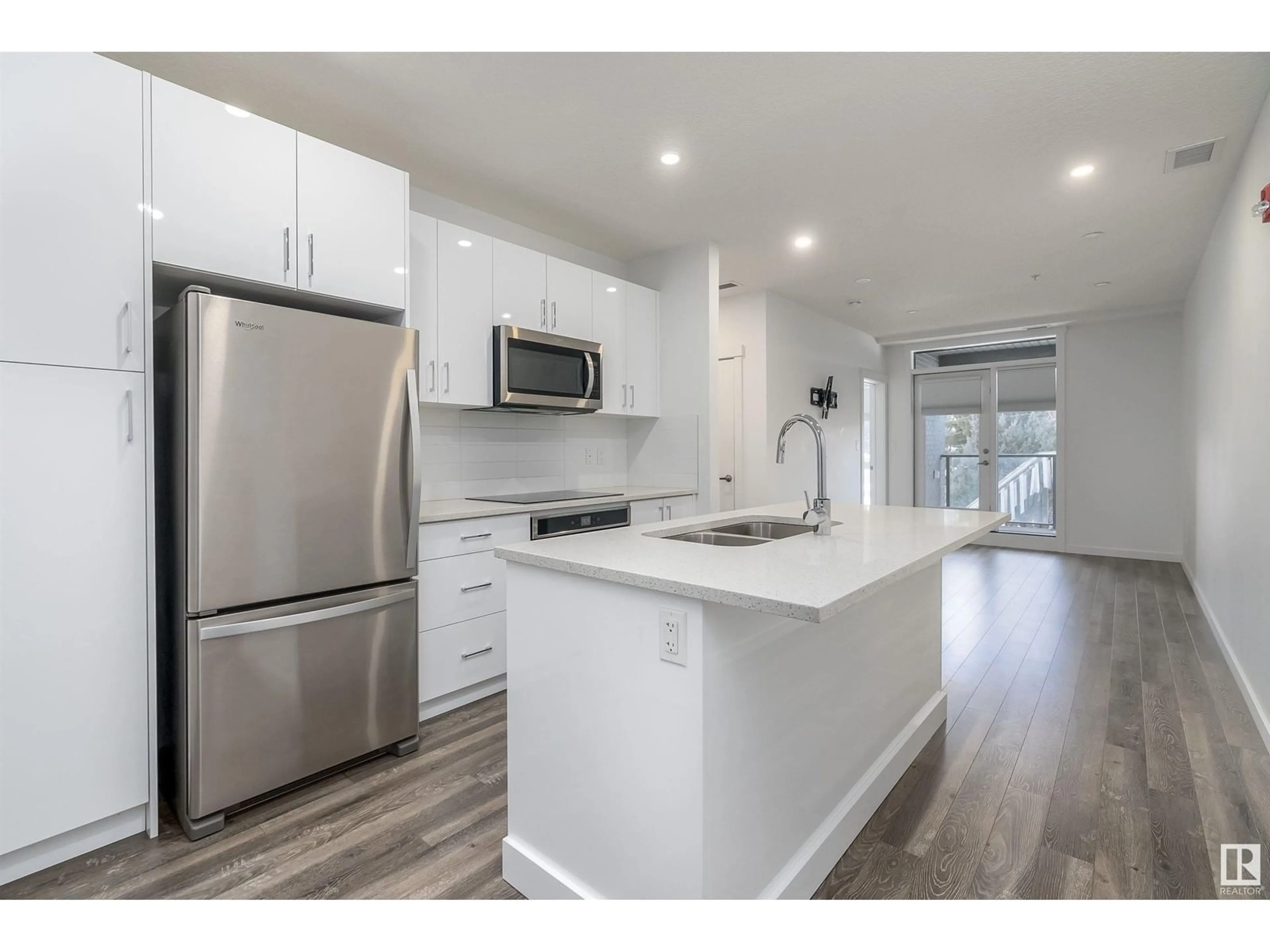 Open concept kitchen, wood/laminate floor for #213 - 11503 76 AV, Edmonton Alberta T6G0K6