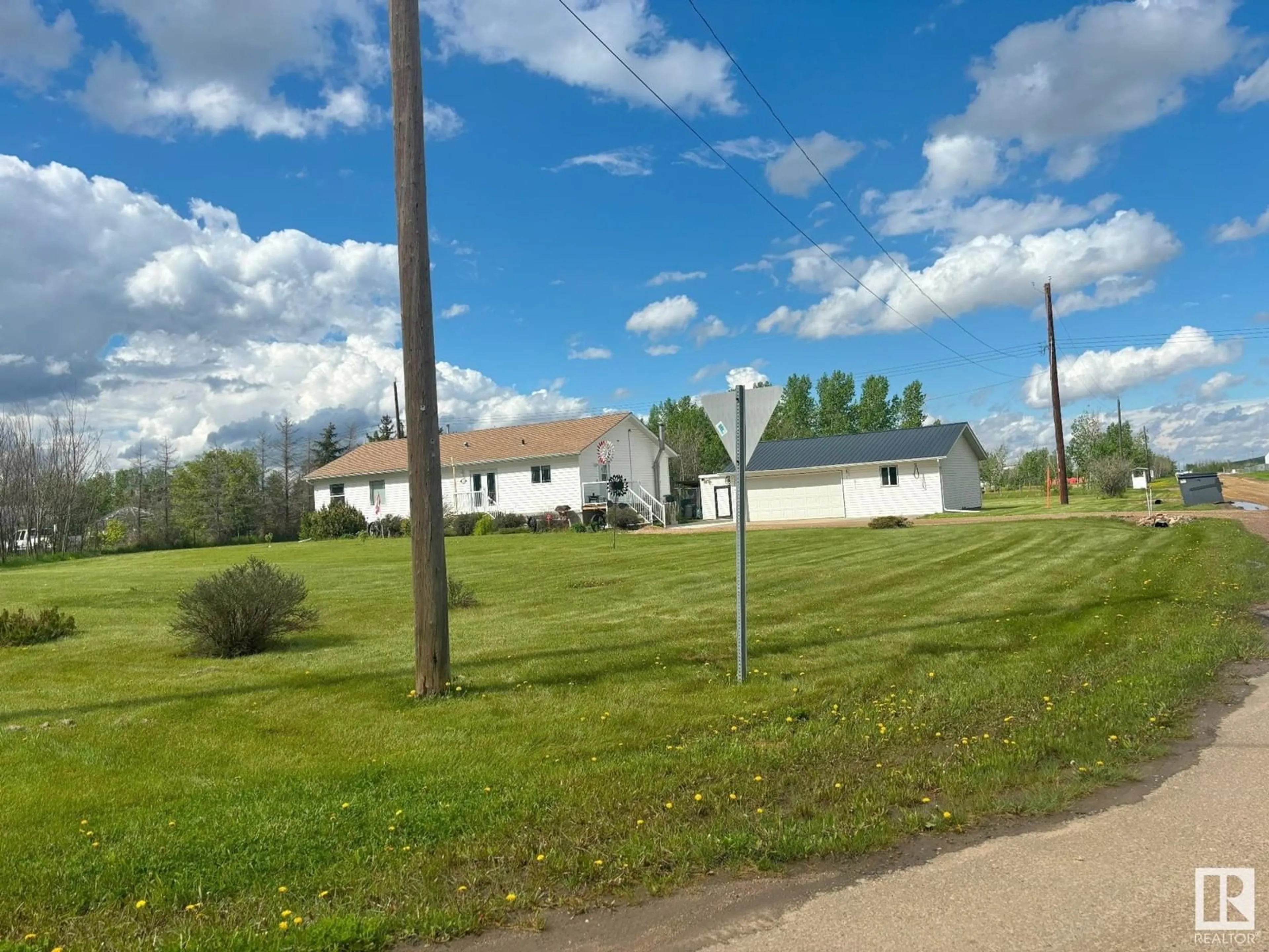 A pic from outside/outdoor area/front of a property/back of a property/a pic from drone, unknown for 4704 50 AV, Ryley Alberta T0B4A0