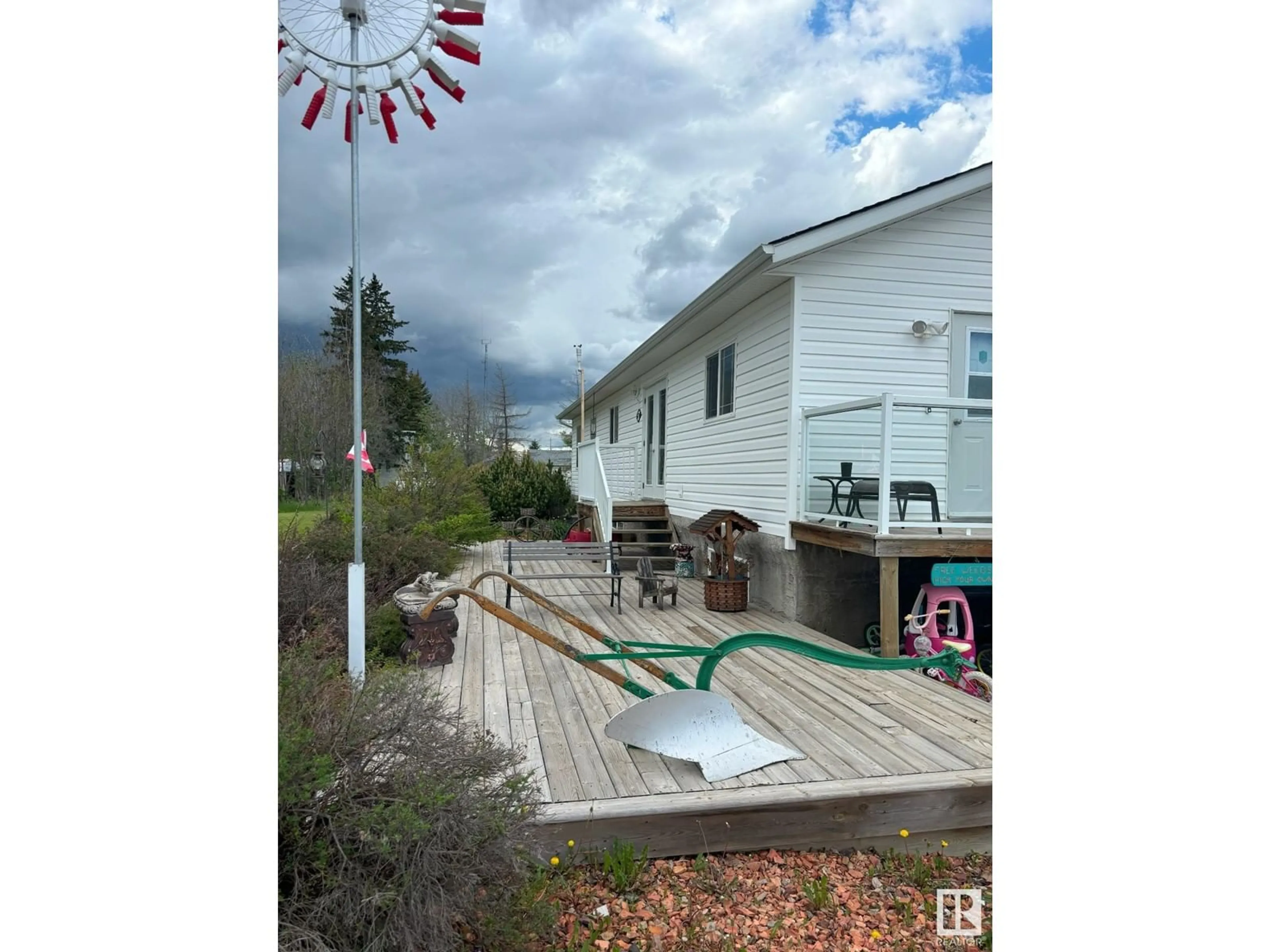 A pic from outside/outdoor area/front of a property/back of a property/a pic from drone, water/lake/river/ocean view for 4704 50 AV, Ryley Alberta T0B4A0