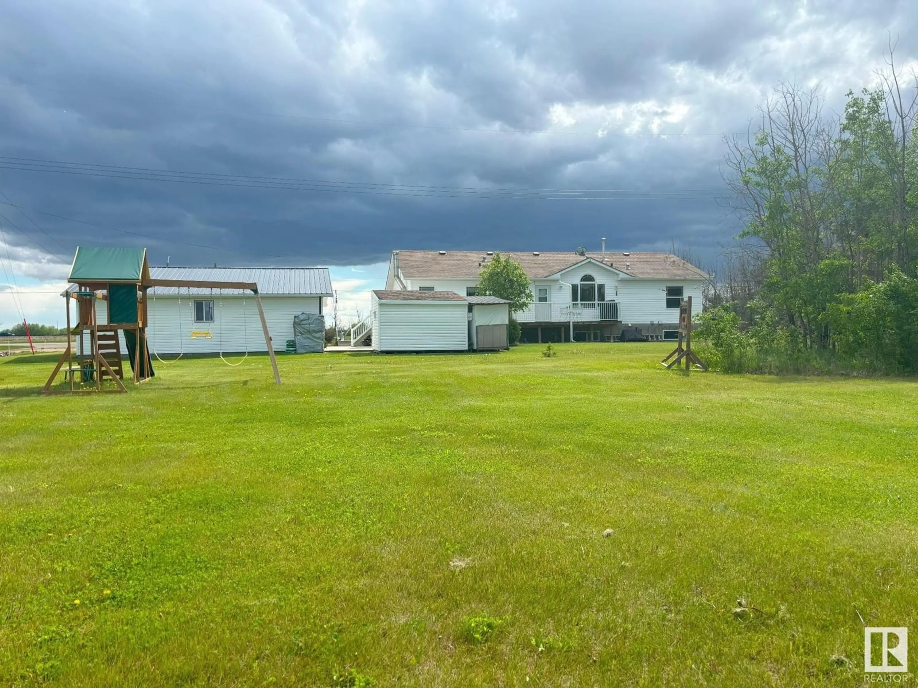 A pic from outside/outdoor area/front of a property/back of a property/a pic from drone, mountain view for 4704 50 AV, Ryley Alberta T0B4A0