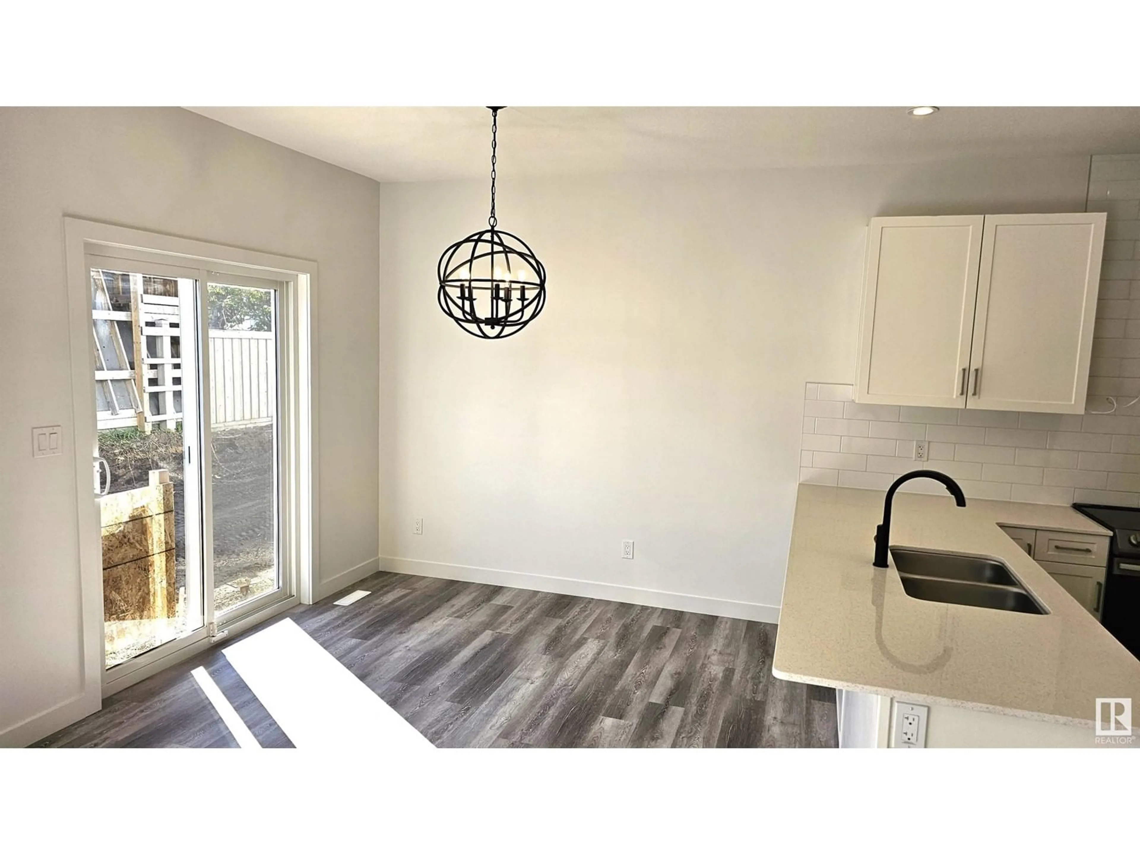 Open concept kitchen, wood/laminate floor for 49 - 5122 213A ST NW, Edmonton Alberta T6M1M6