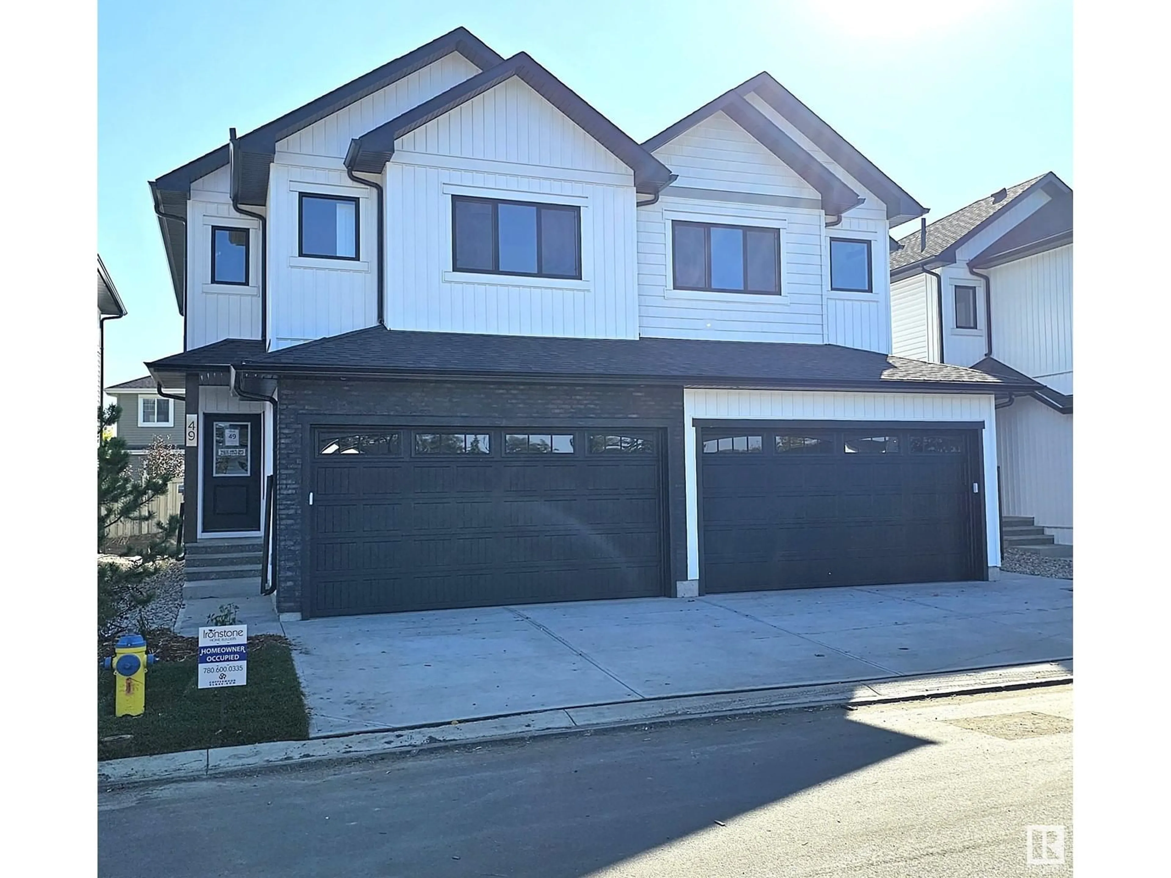 Home with vinyl exterior material, street for #49 5122 213A ST NW, Edmonton Alberta T6M1M6