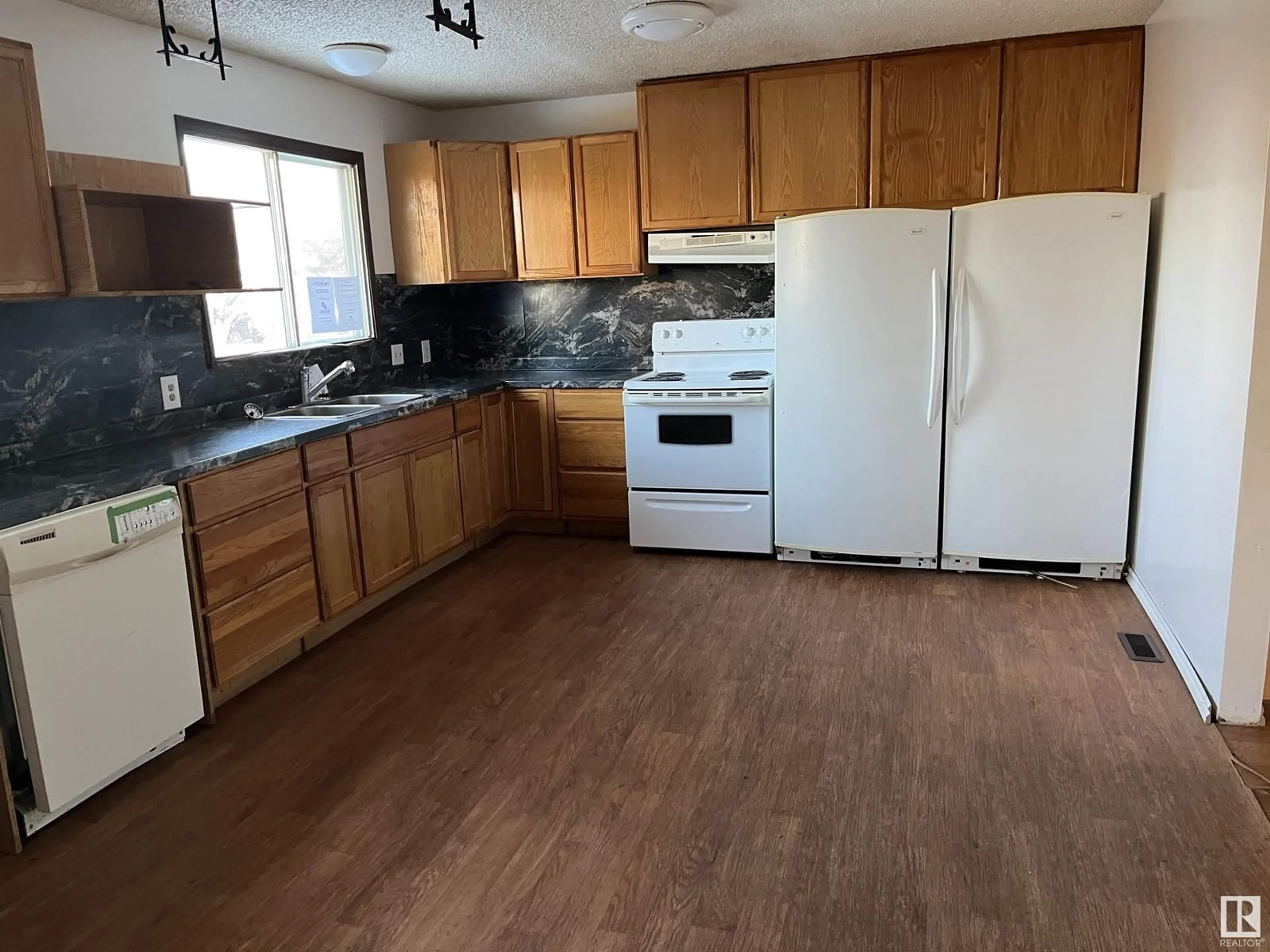 Standard kitchen, wood/laminate floor for 4809 45 ST, Bonnyville Town Alberta T9N1G8