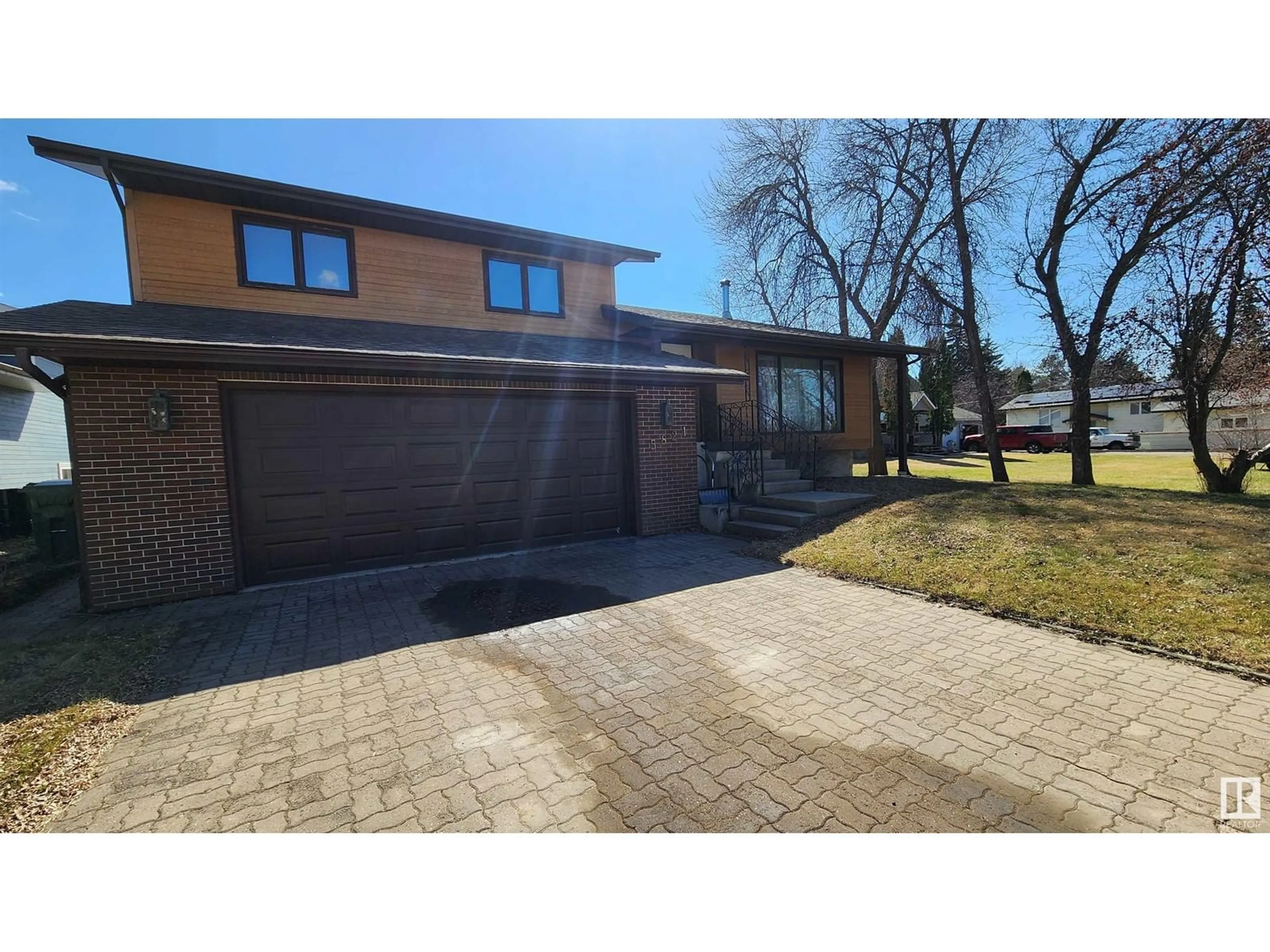 Home with brick exterior material, street for 5821 52 AV, Vermilion Alberta T9X1V7