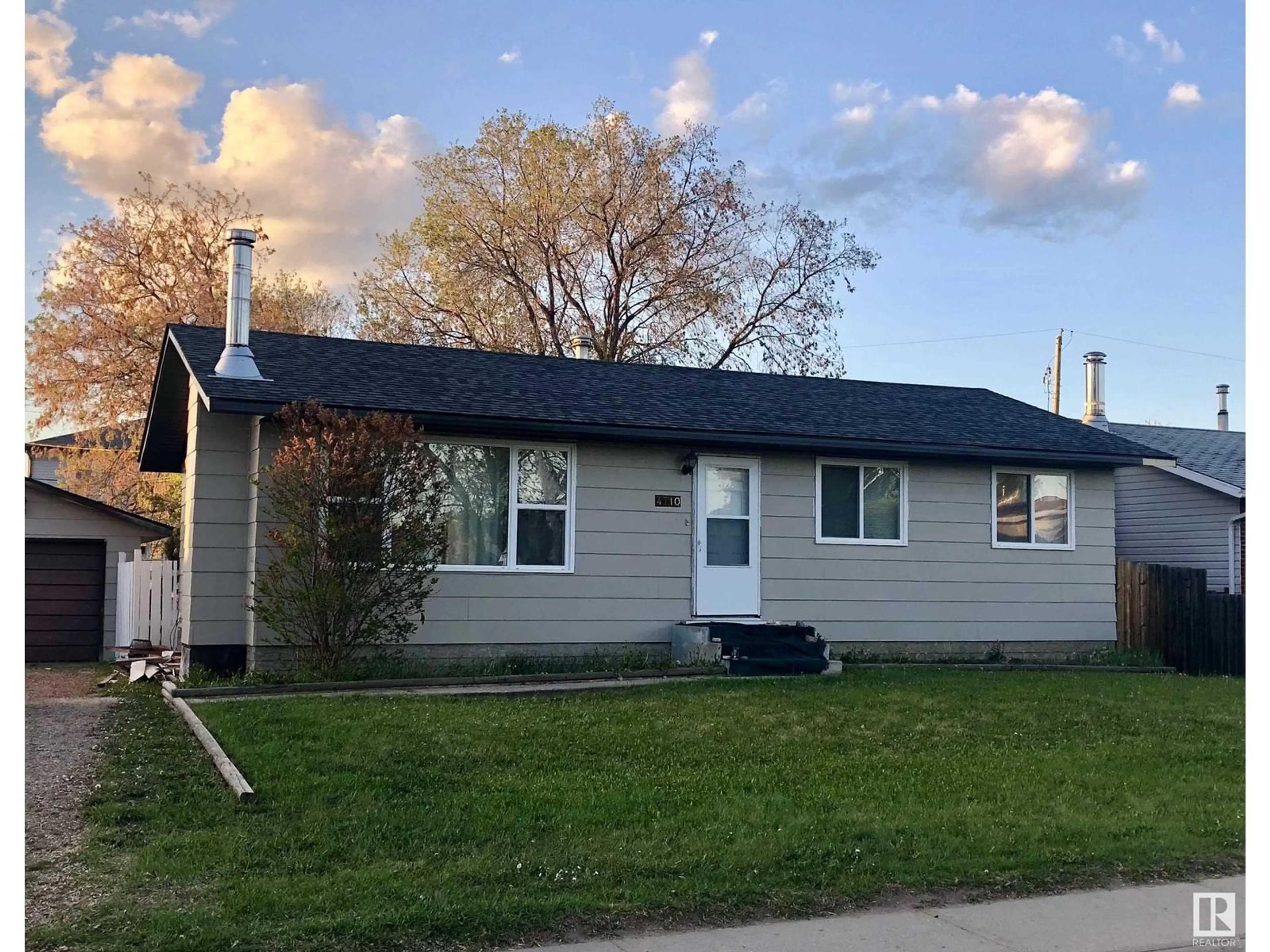 Home with vinyl exterior material, street for 4710 51 AV, Cold Lake Alberta T9M1Y9