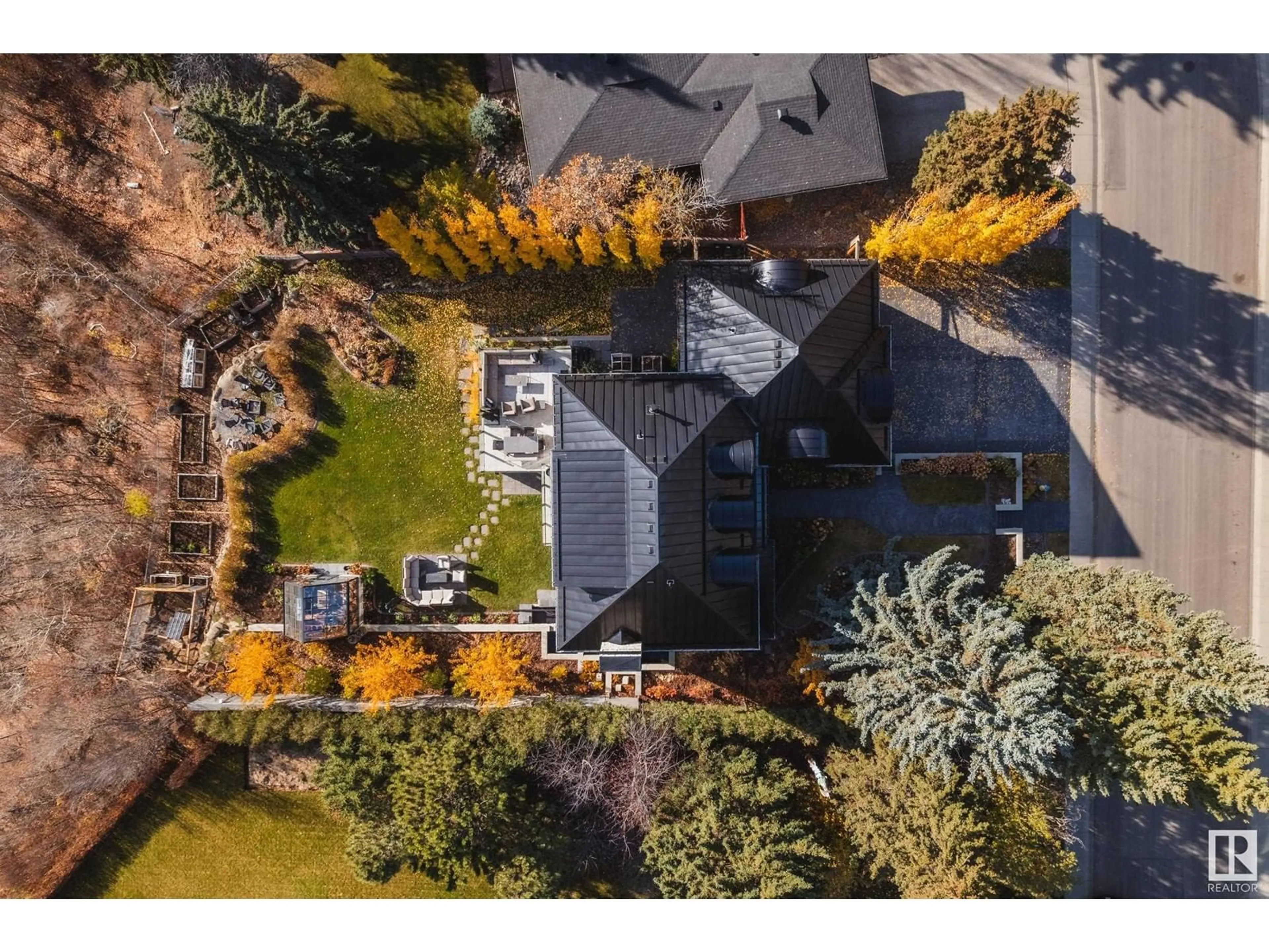 A pic from outside/outdoor area/front of a property/back of a property/a pic from drone, street for 15309 RIO TERRACE DR NW, Edmonton Alberta T5R5M6