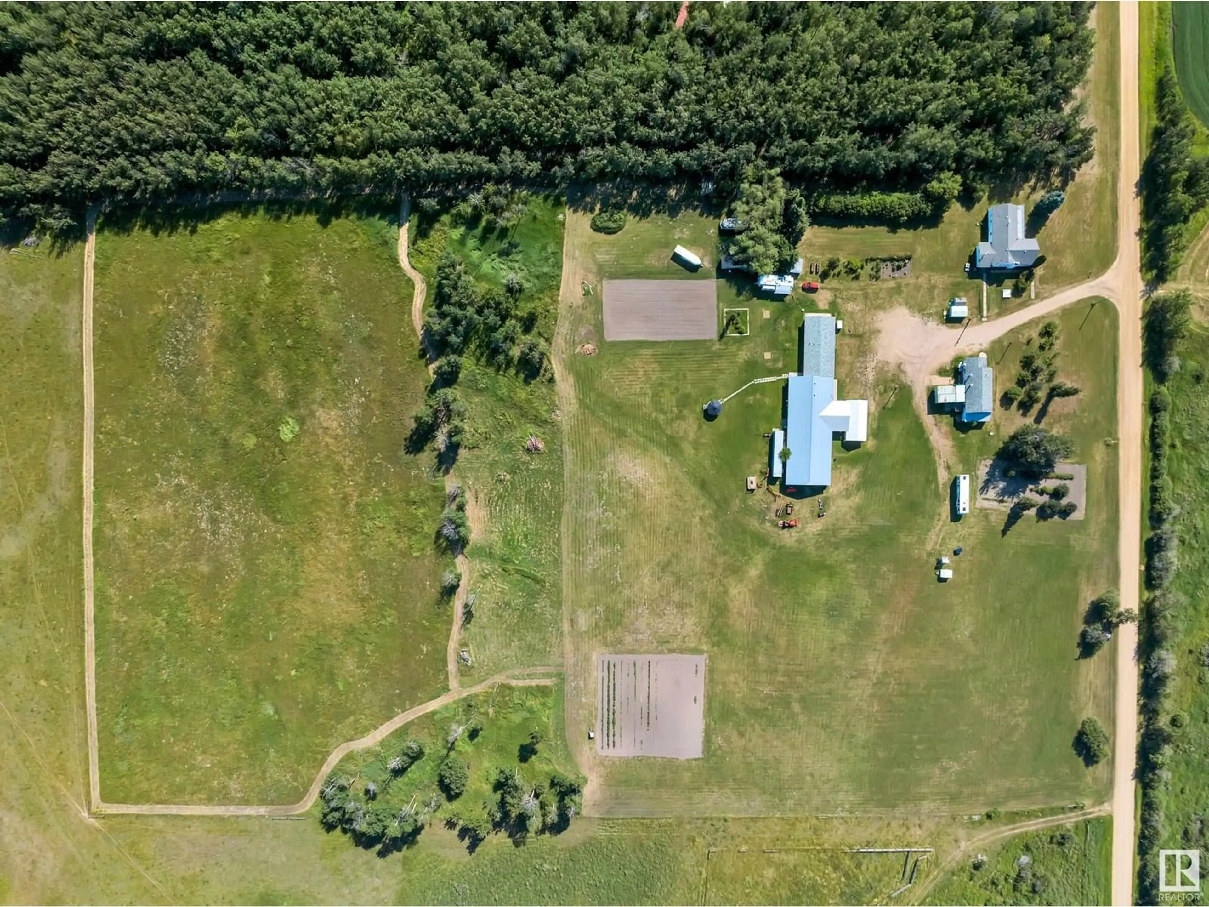 A pic from outside/outdoor area/front of a property/back of a property/a pic from drone, unknown for 272044 TWP RD 475, Rural Wetaskiwin County Alberta T0C2P0
